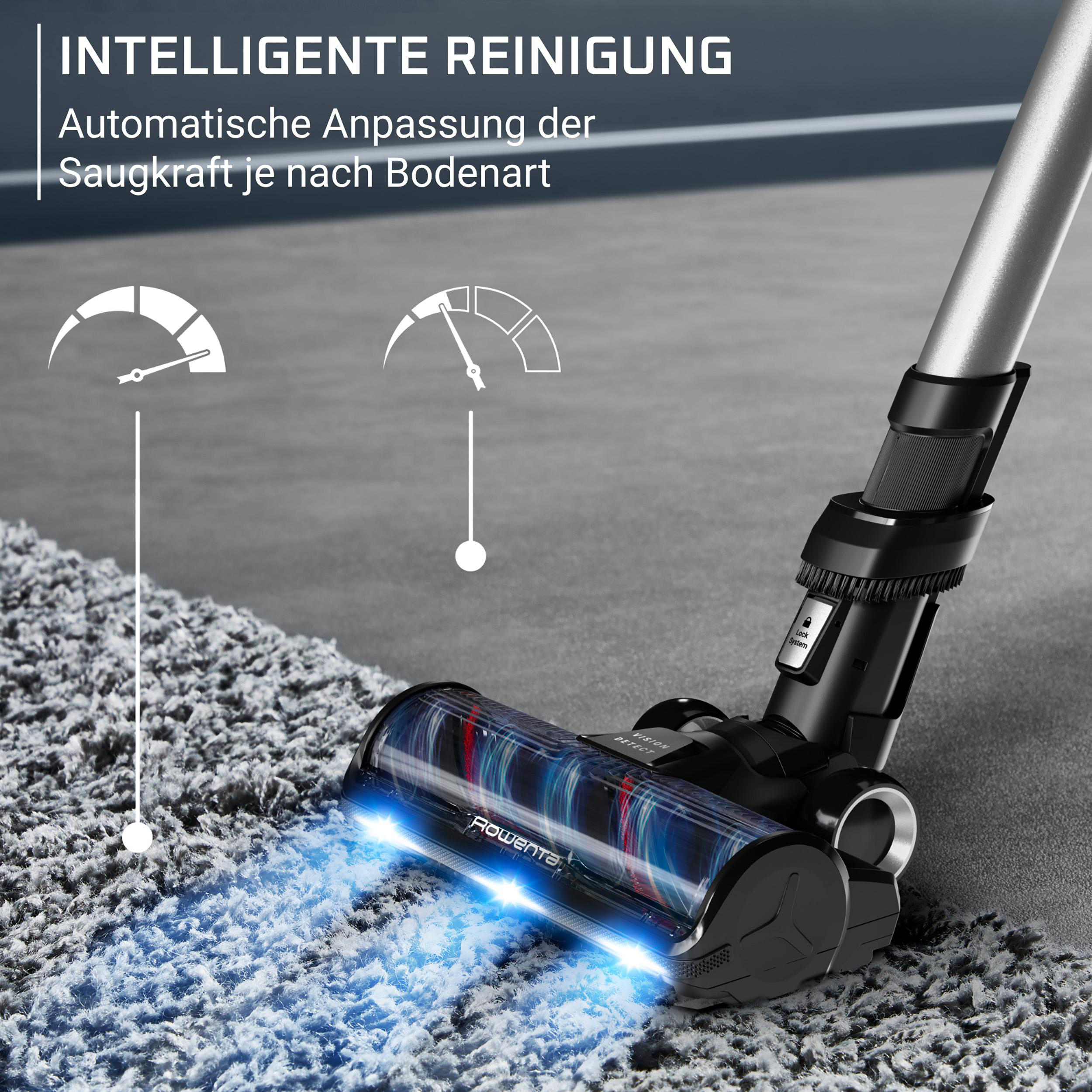 Bodenstaubsauger reinigt Teppichboden mit blauen Lichtern. Saugkraftanzeige.