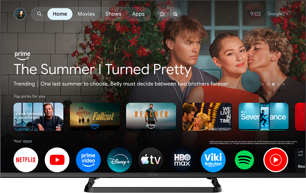 Google TV kezdőképernyő film- és alkalmazáselőnézetekkel. Elöl egy pár.