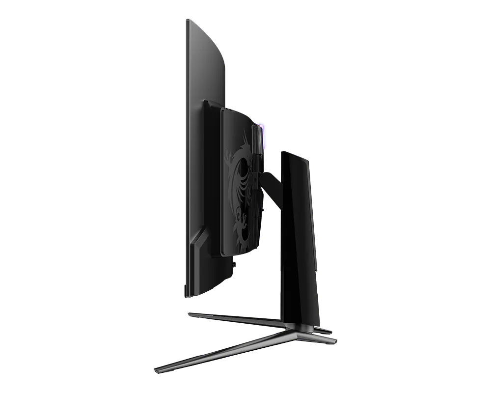 Monitor gaming negro con logo de dragón e iluminación RGB, mostrado de lado.