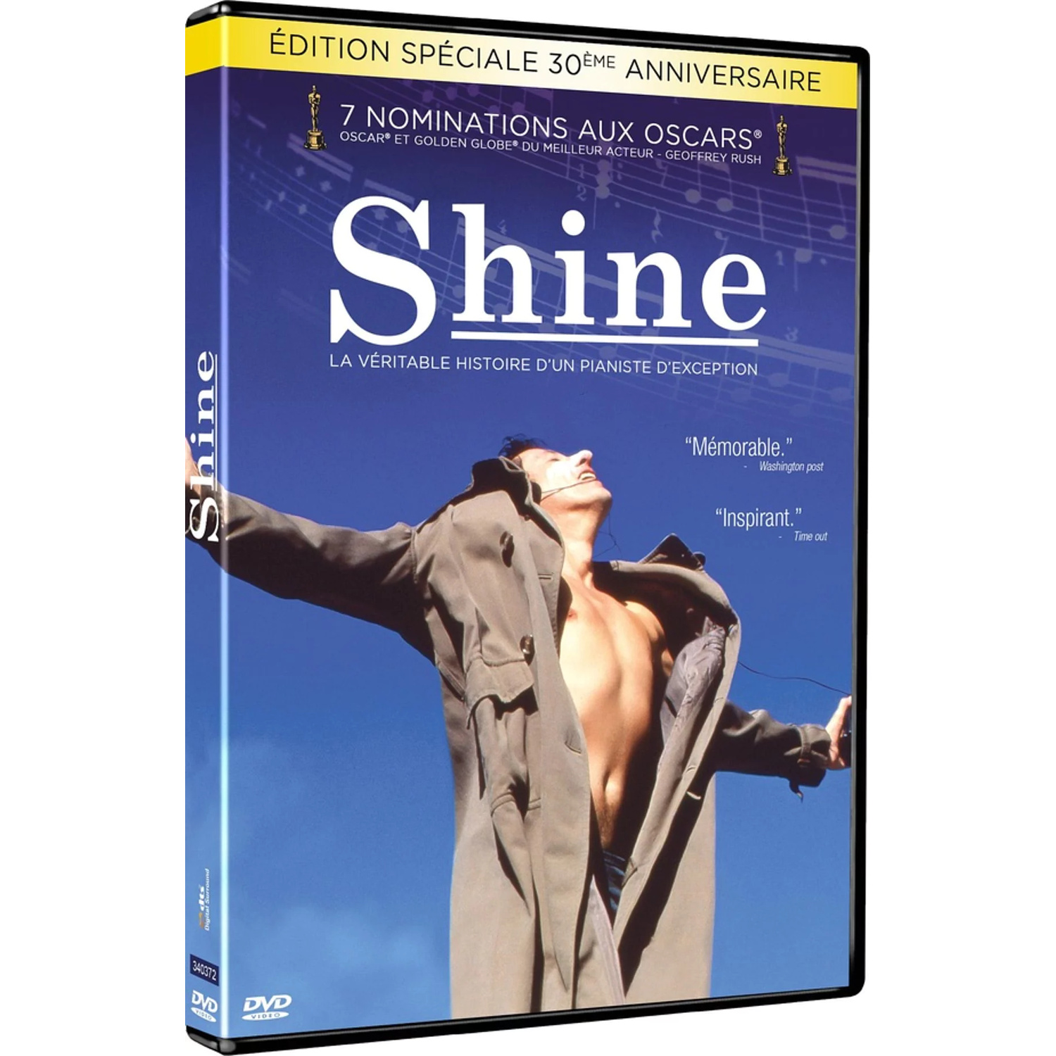 Coffret DVD avec homme en manteau sous ciel bleu, titre : Shine.