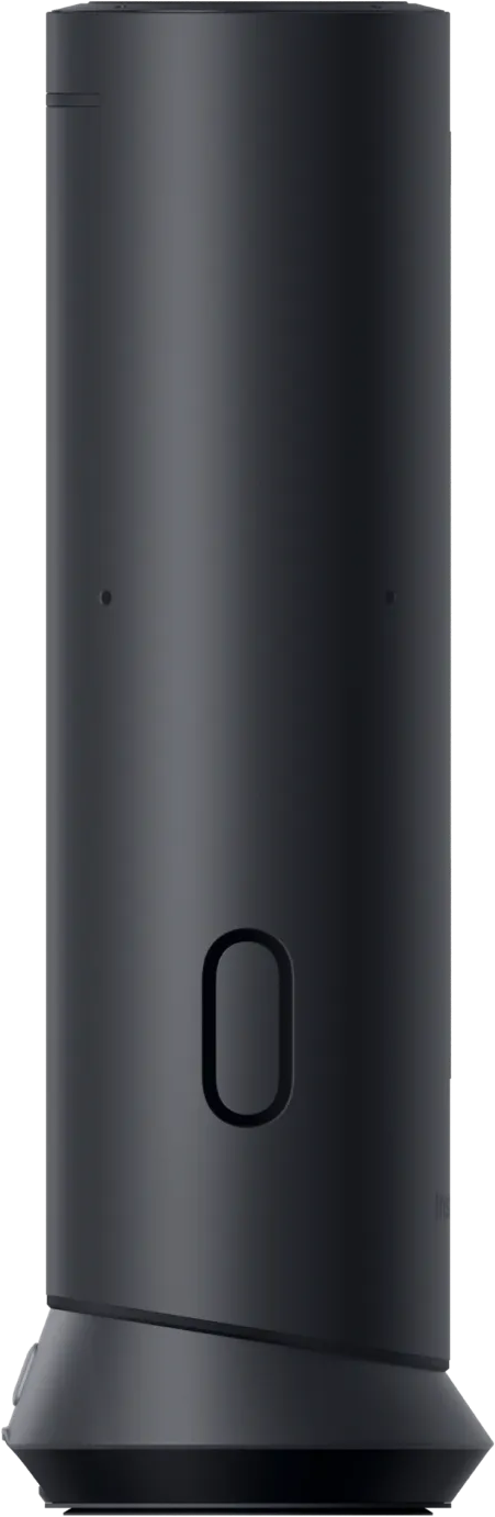 Un objet cylindrique sombre avec une découpe ovale et une base large.