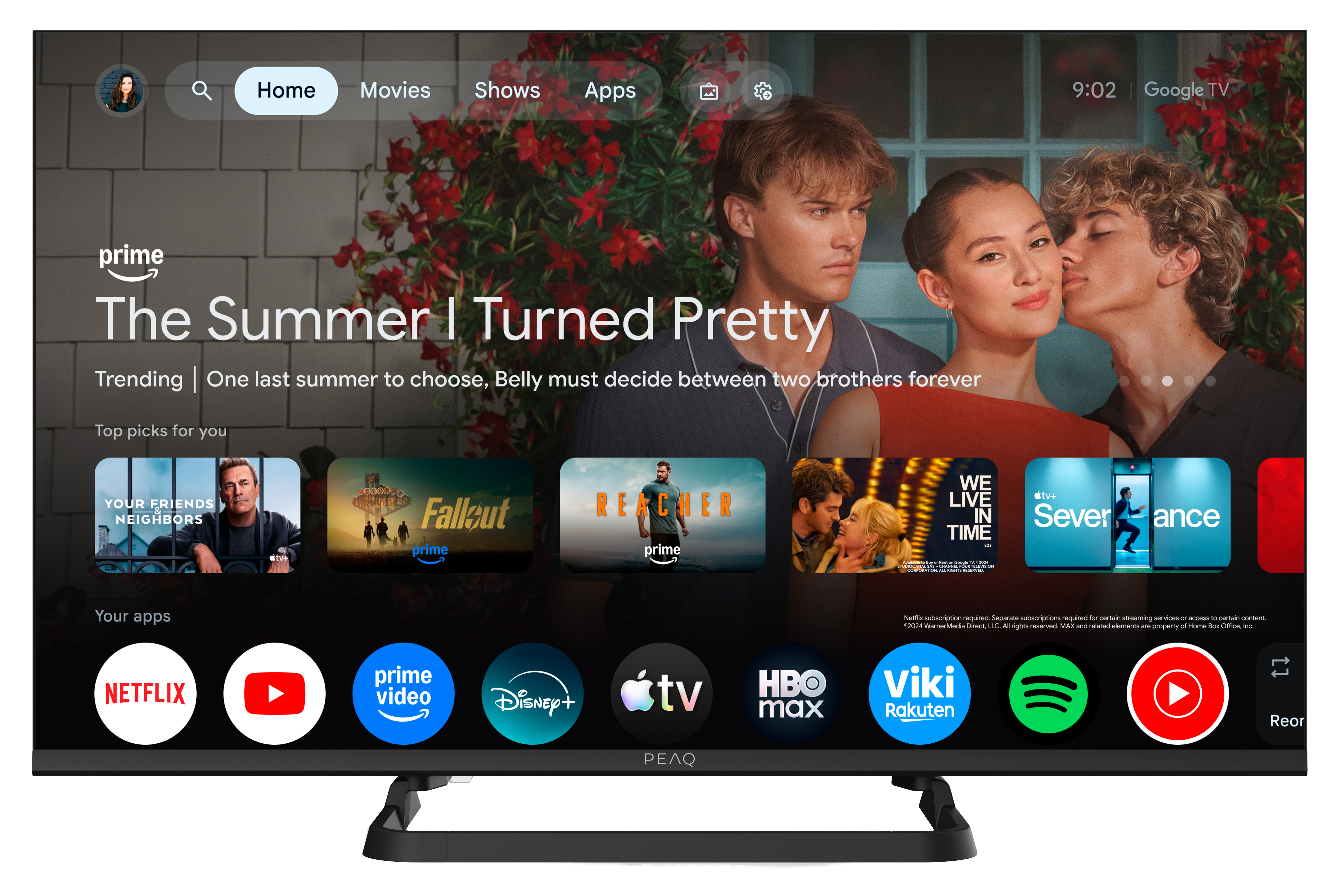 Ekran główny telewizora z filmami i aplikacjami. Ikony aplikacji, takie jak Netflix i YouTube, są na pierwszym planie.