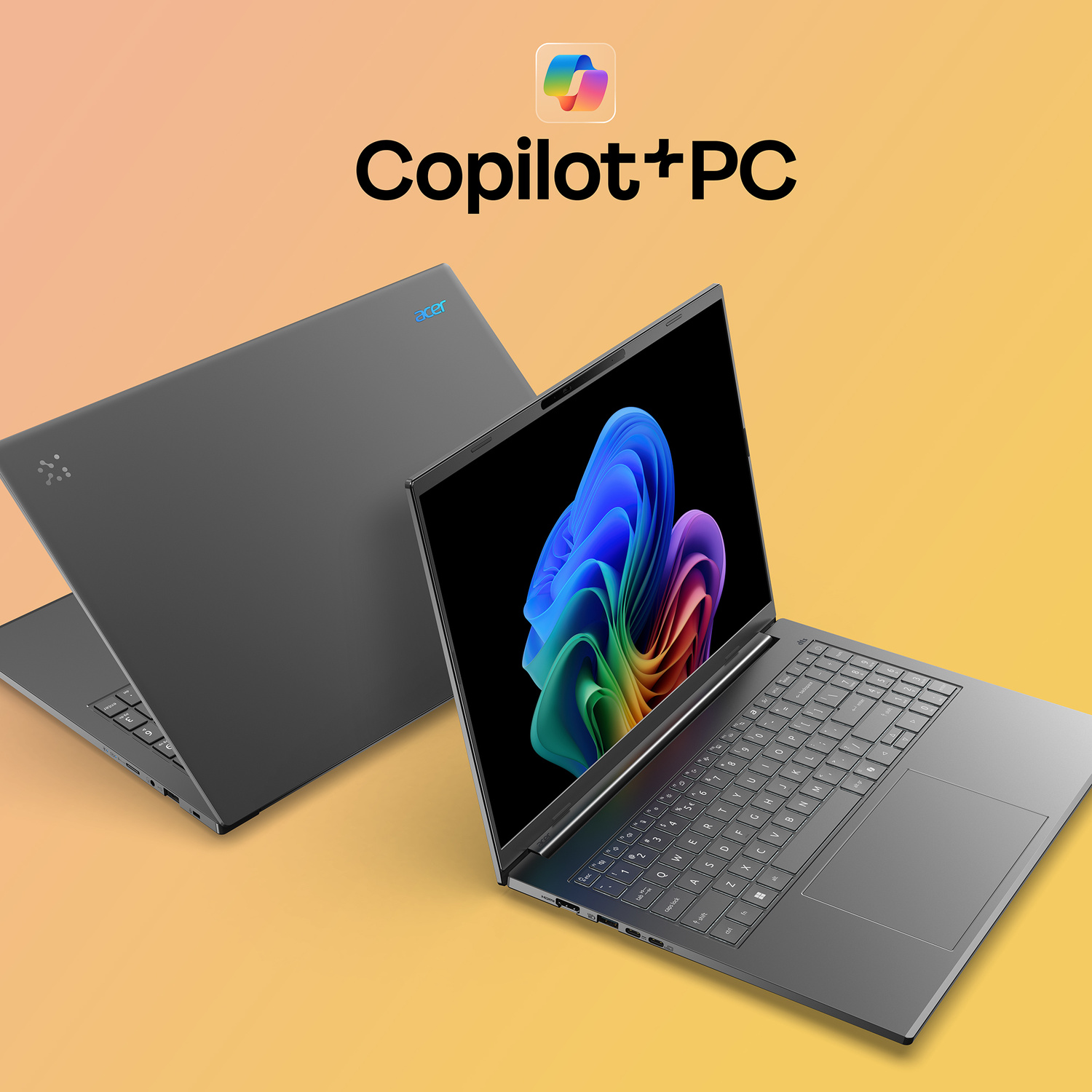 Due laptop grigi con logo "Copilot+PC" su sfondo colorato.