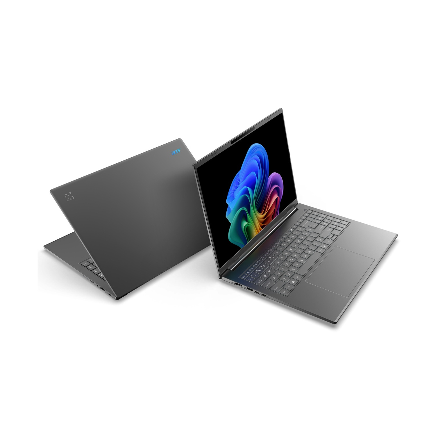 Vengono visualizzati due laptop Acer grigio scuro. Uno è aperto, mostra uno sfondo astratto colorato e una tastiera.