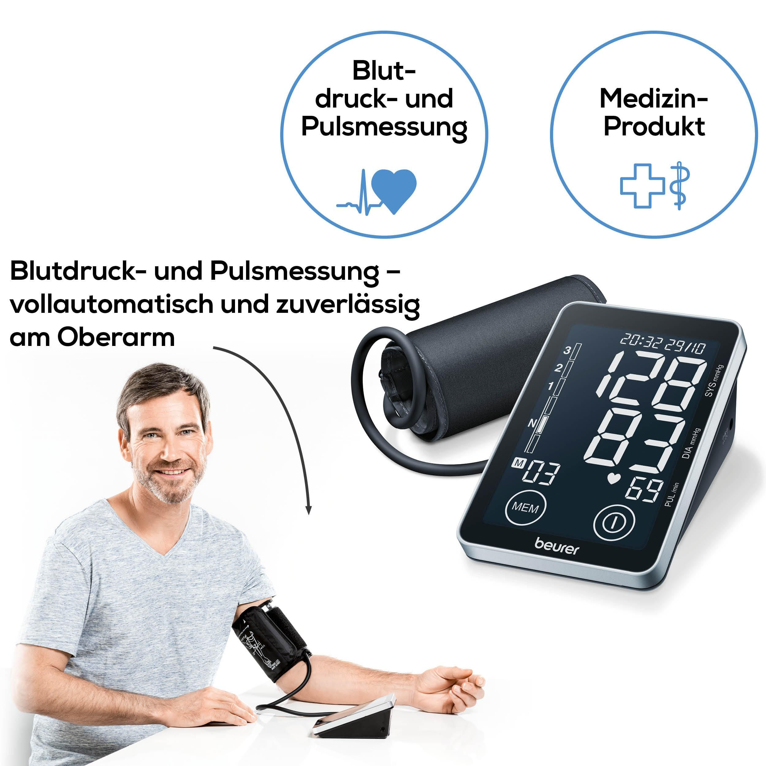 Mann misst Blutdruck am Oberarm mit einem Beurer Gerät. Anzeige zeigt 128/83.