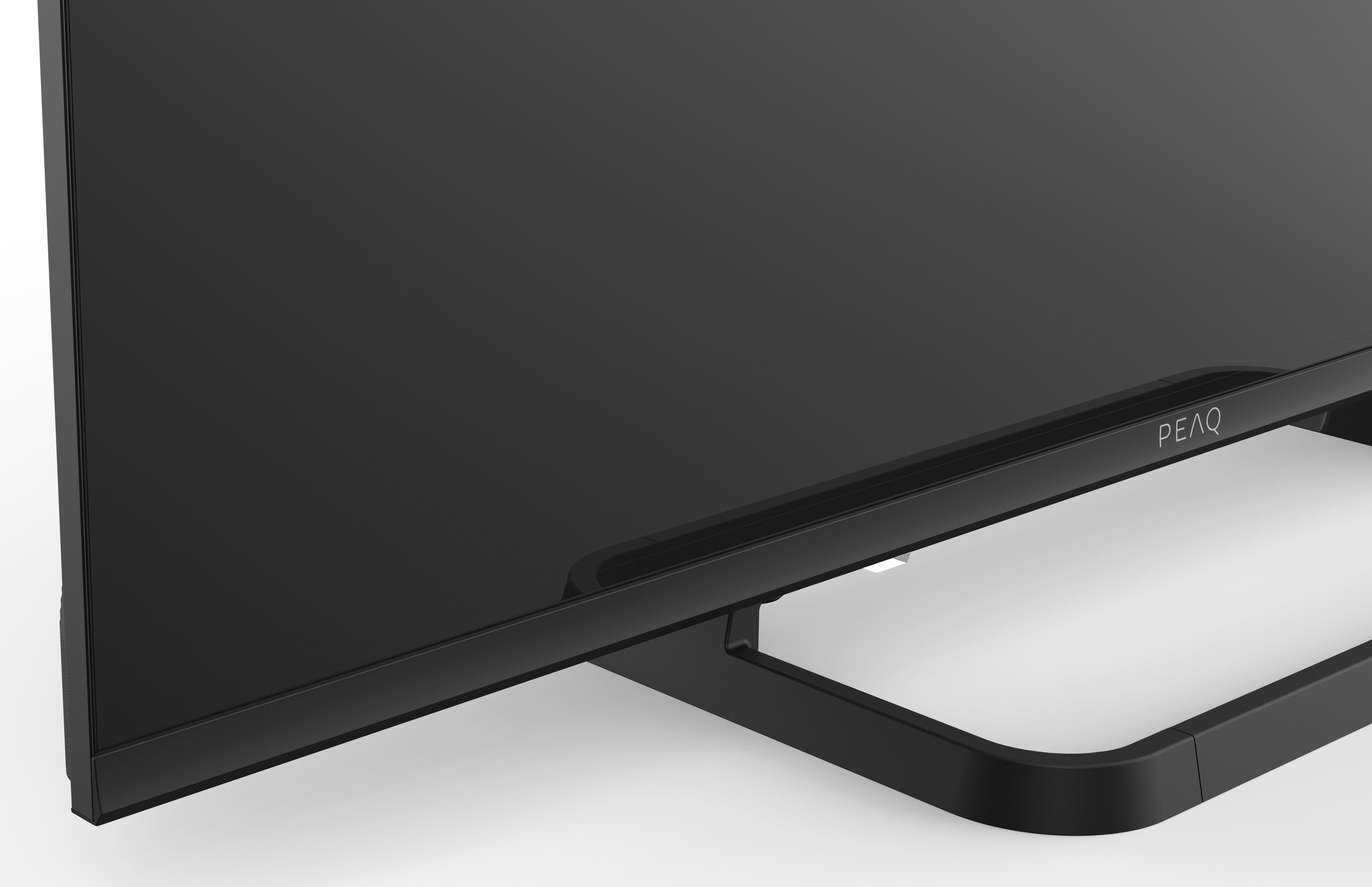 Zbliżenie czarnego monitora z czarnym stojakiem. Widoczna nazwa marki.