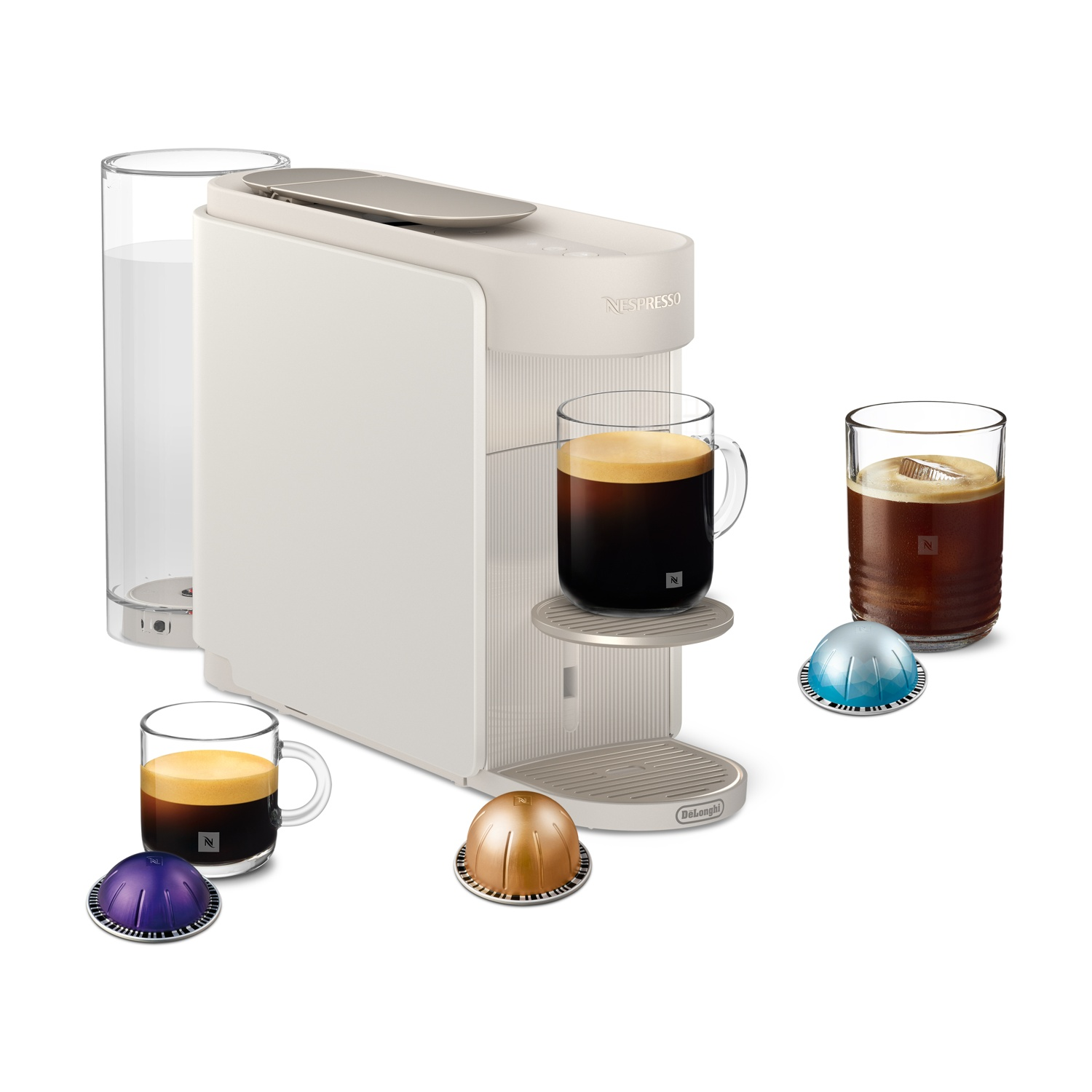 Una macchina da caffè Nespresso beige con tazze da caffè e capsule.