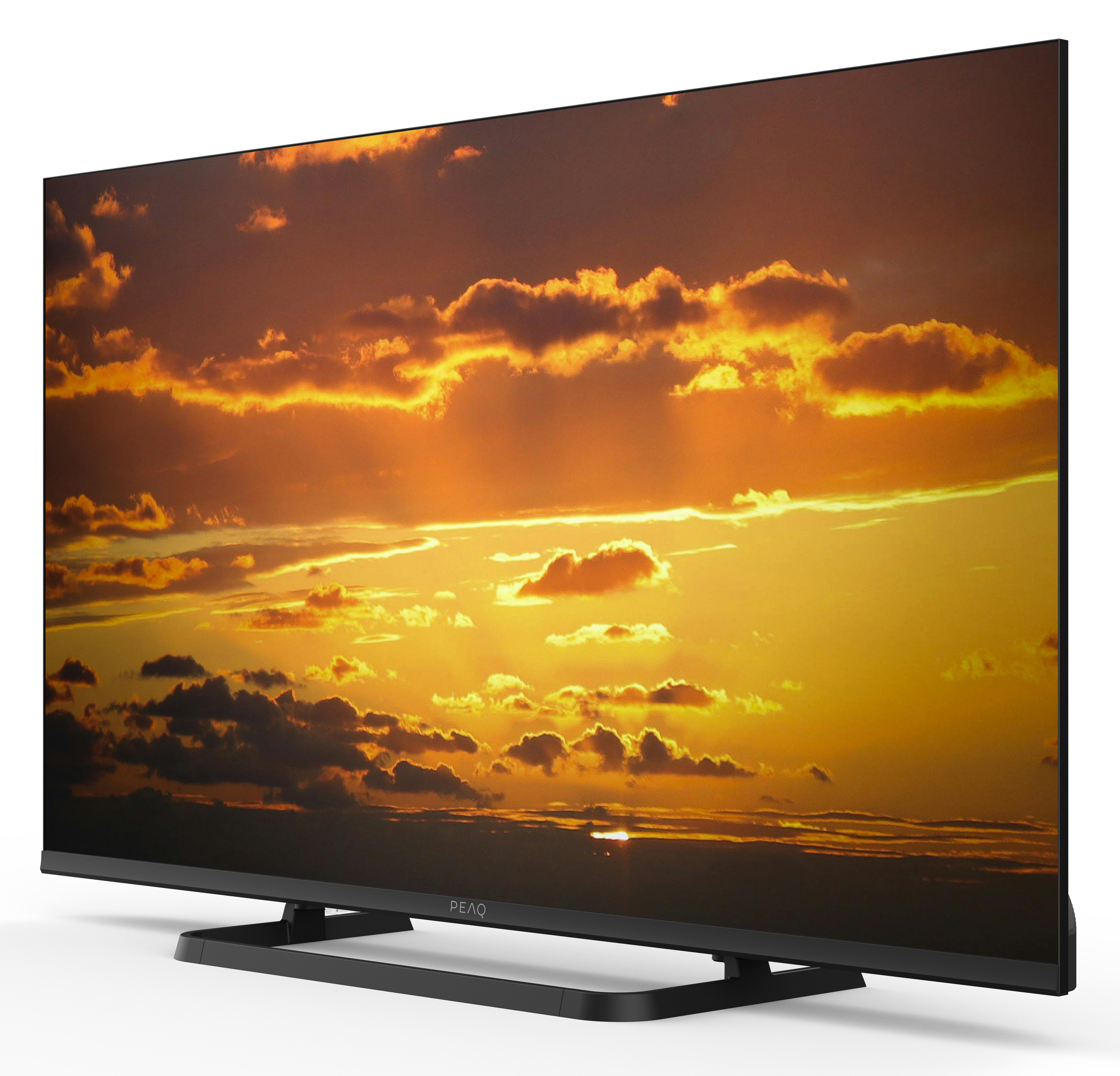 Nowoczesny telewizor wyświetlający niebo o zachodzie słońca na ekranie.