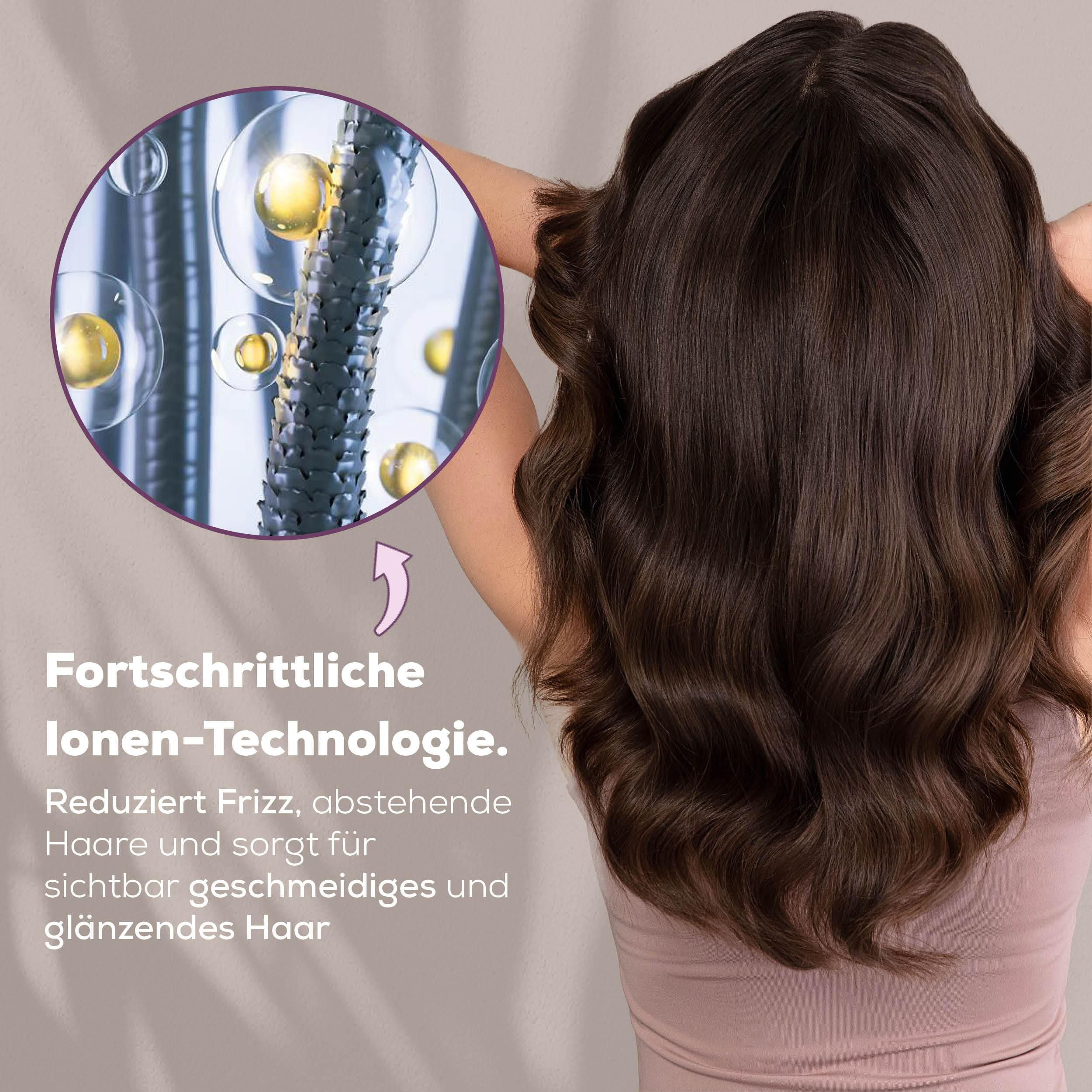 Nahaufnahme von Haarsträhnen mit Öltröpfchen und einem stilisierten Pfeil.