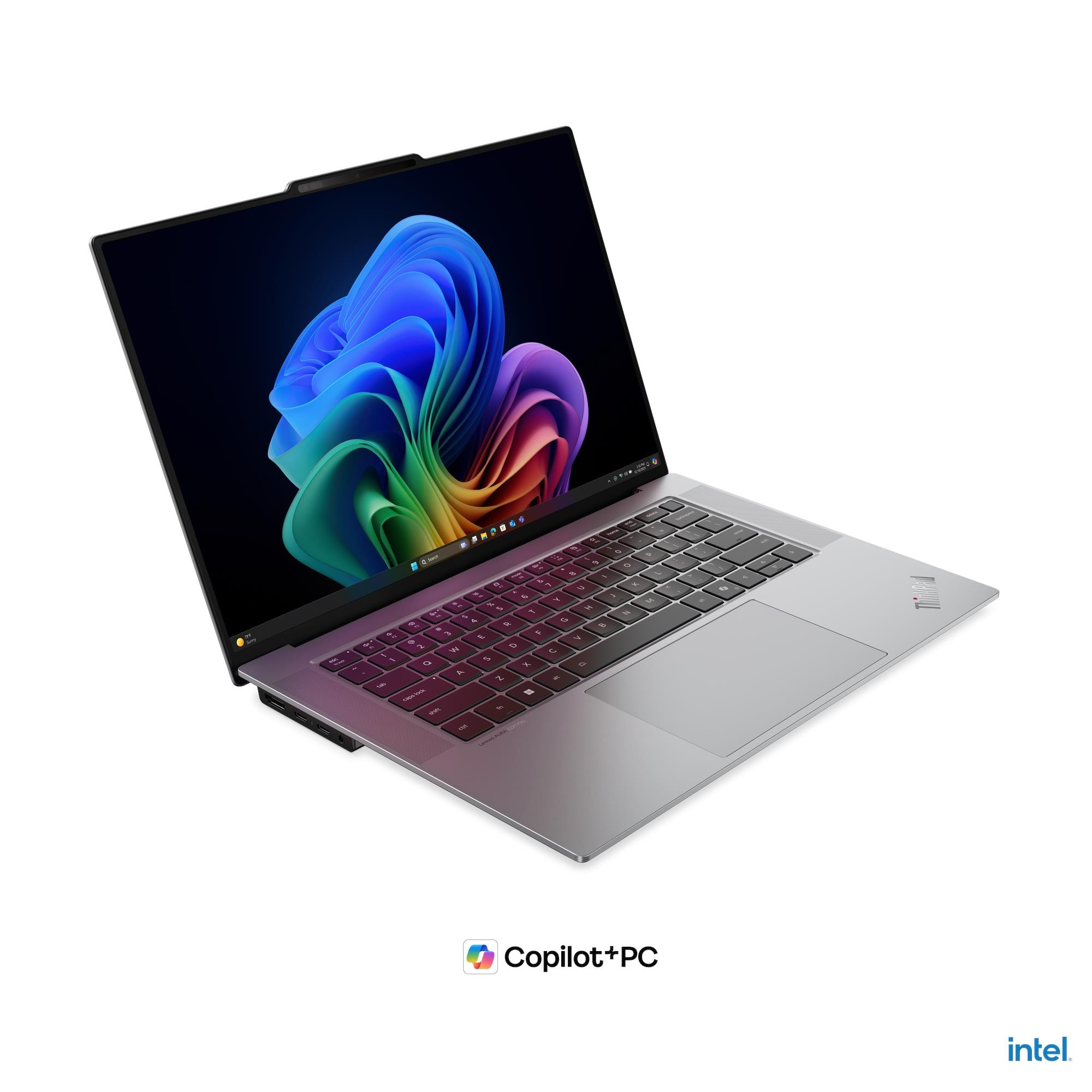 Ein offener Laptop mit farbenfrohem Hintergrundbild und Intel Copilot+ PC Logo.