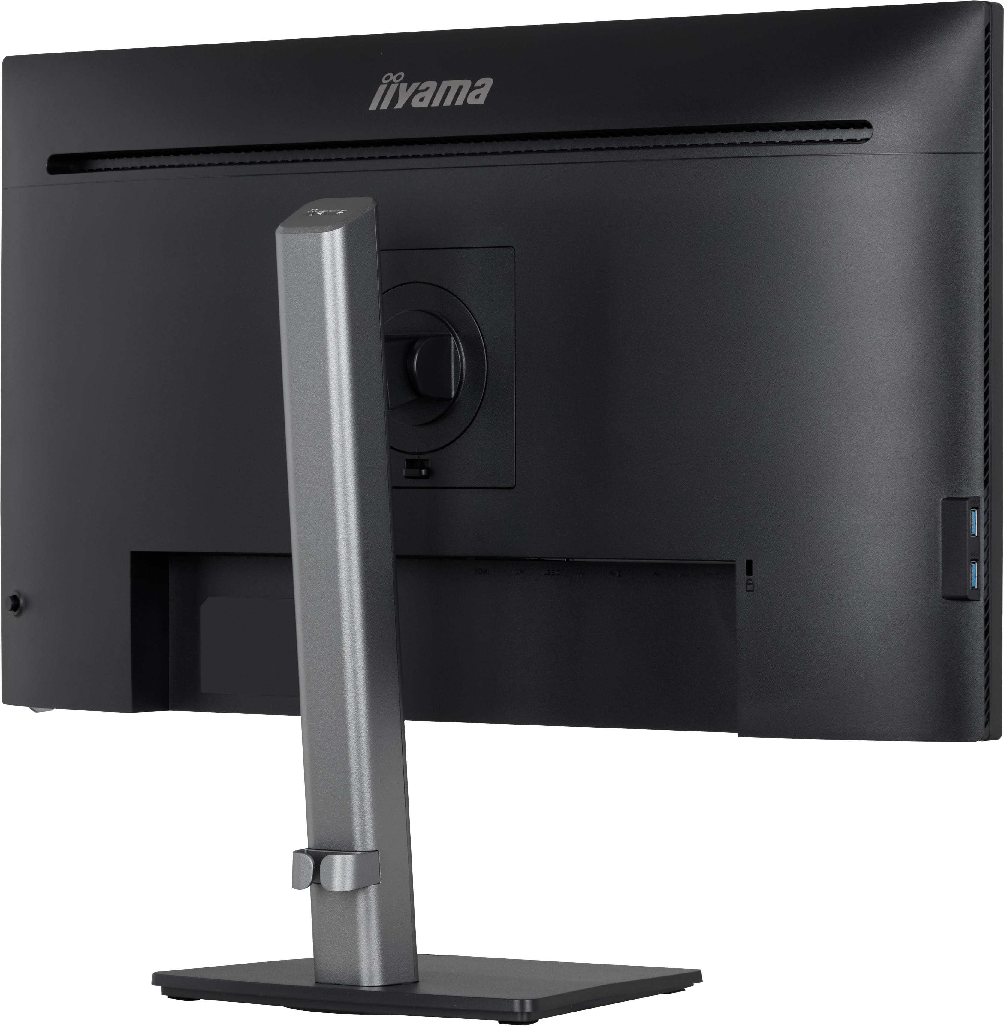 Rückseite eines schwarzen Monitors mit silbernem Standfuß und Anschlüssen.