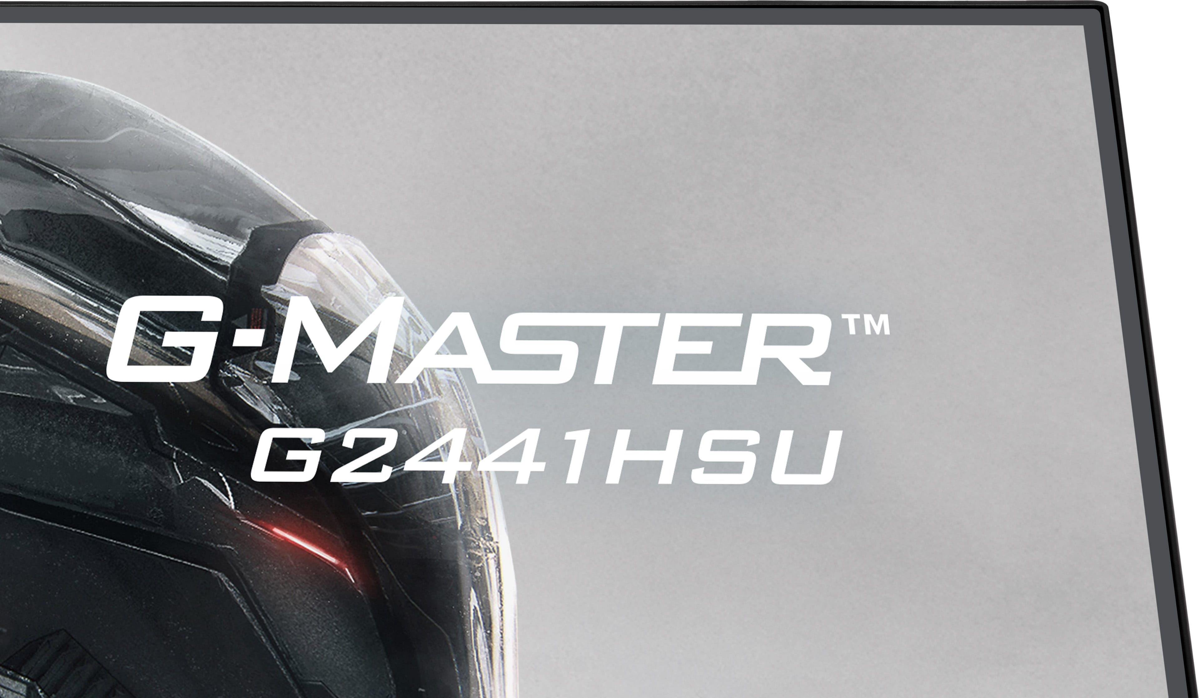 Część czarnego monitora z czerwonym światłem i napisem 'G-MASTER G2441HSU'.