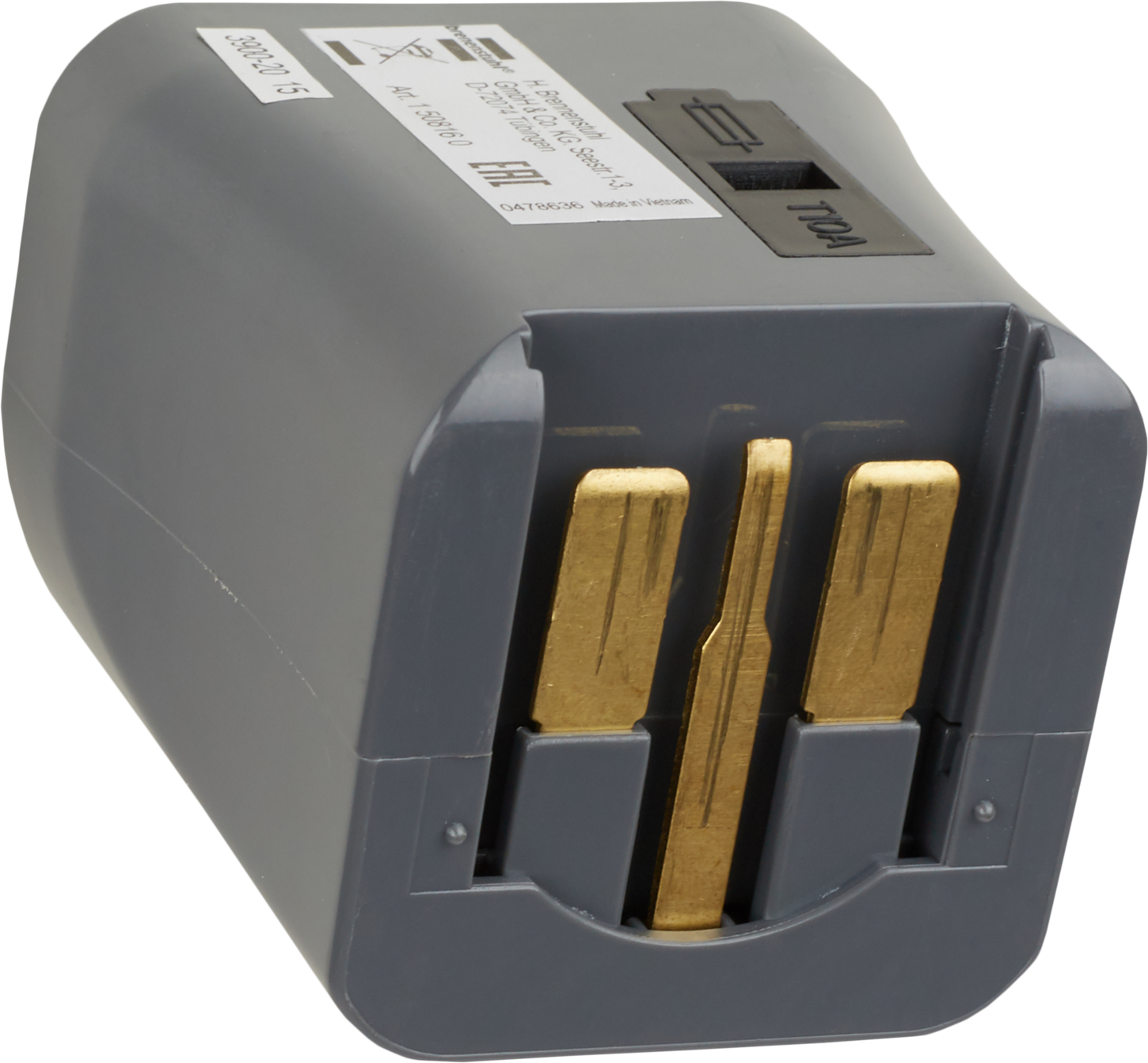 Grauer Reiseadapter mit drei goldenen Steckern und einem Schalter.
