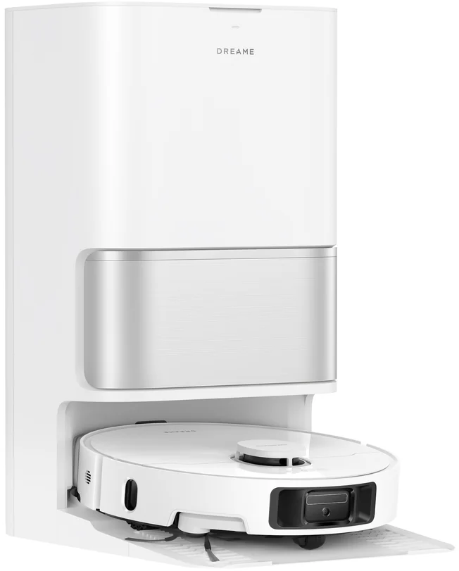Un robot aspirateur blanc dans sa station de charge.