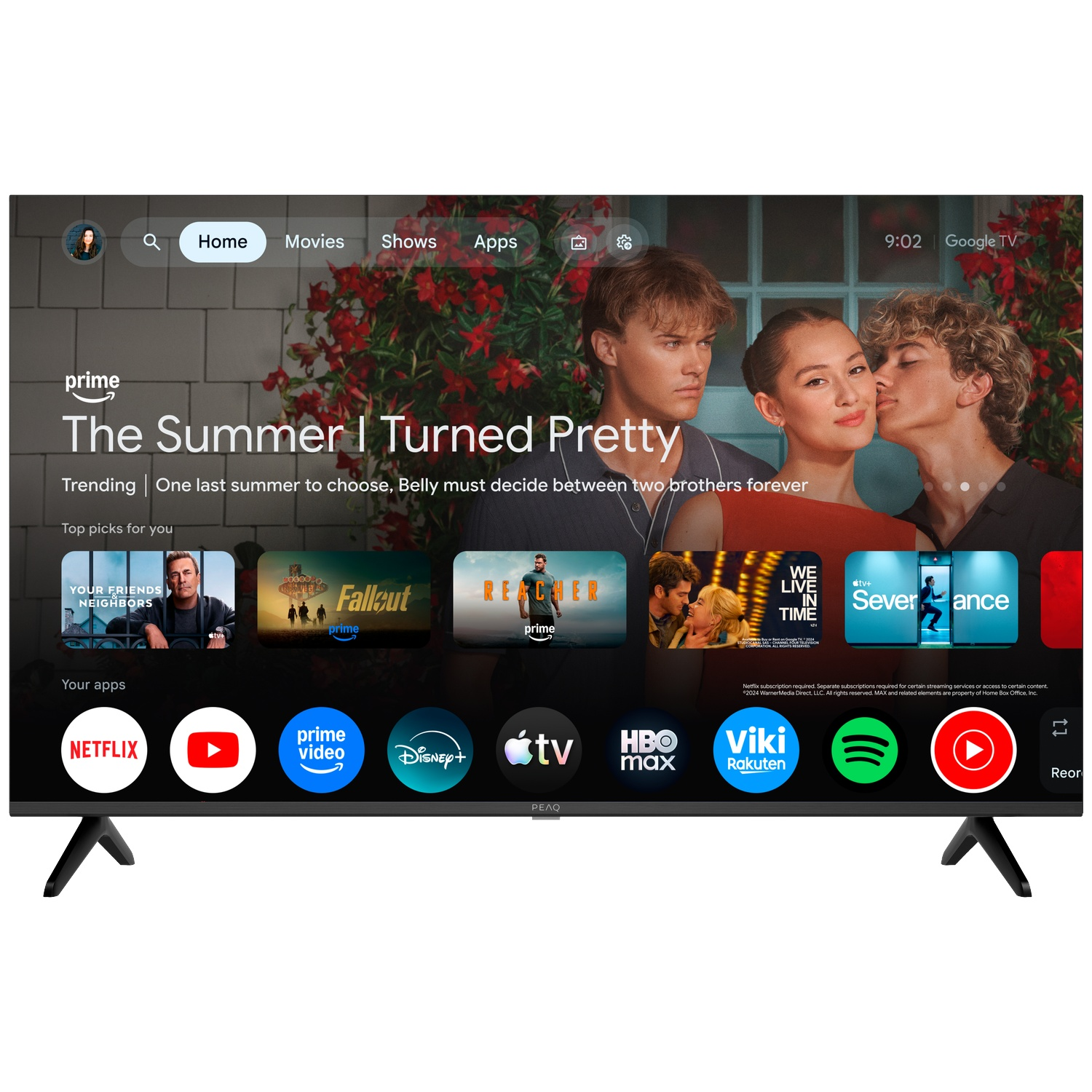 Une télévision affiche l'écran d'accueil de Google TV avec des films et des applications.