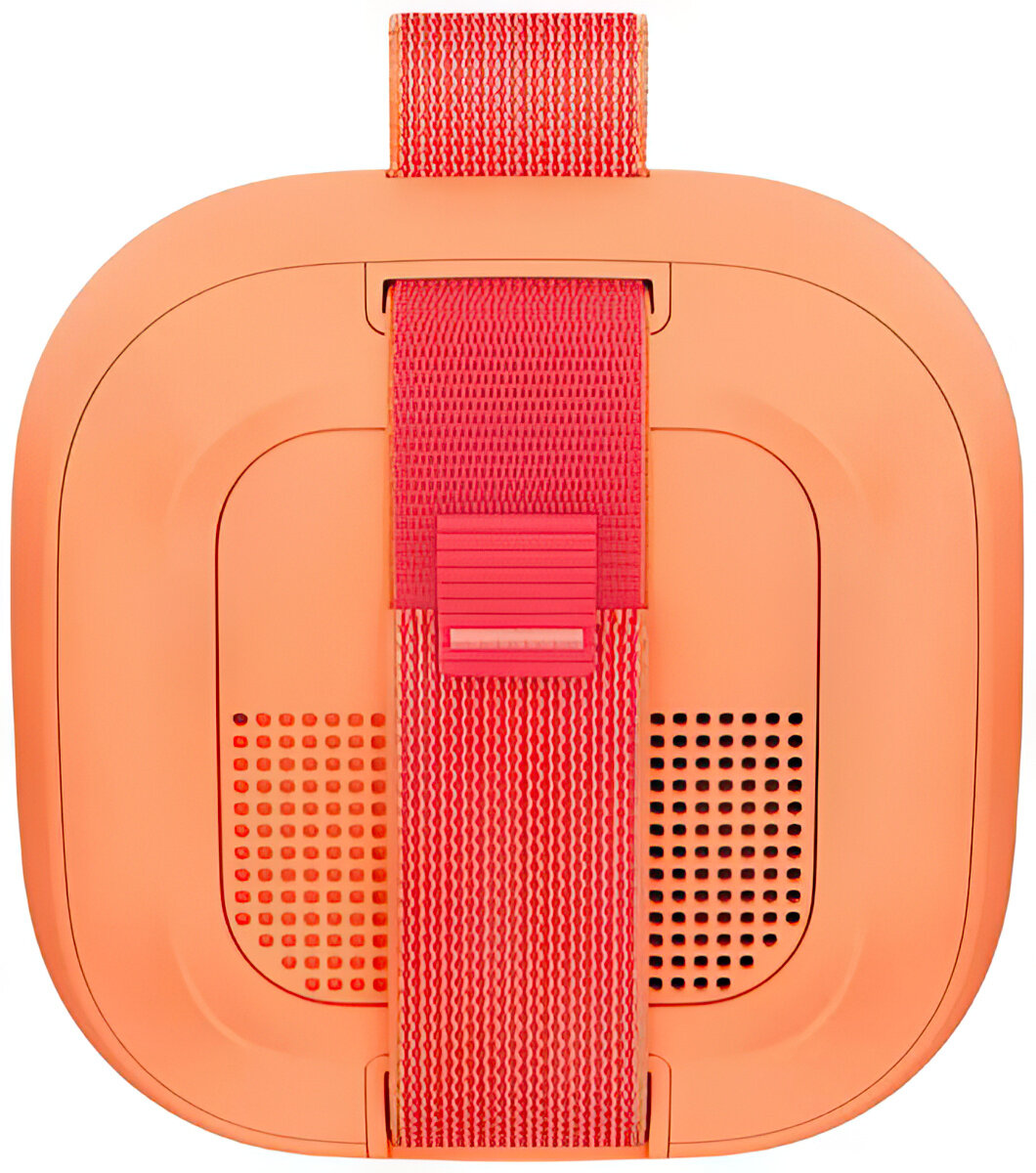 Pomarańczowy głośnik z czerwoną taśmą i grillami głośnikowymi.