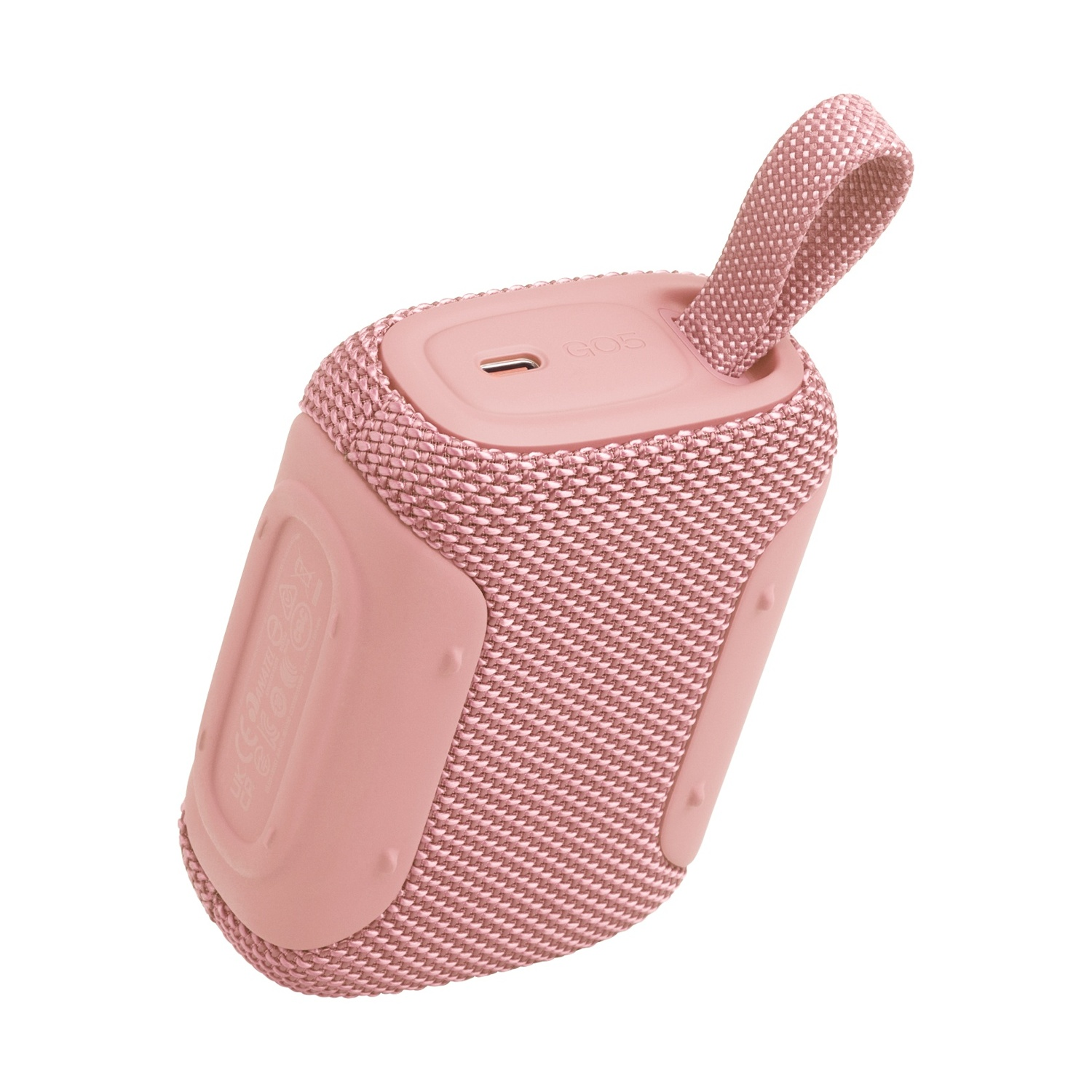 Un piccolo speaker Bluetooth rosa con copertura in tessuto e un laccio.