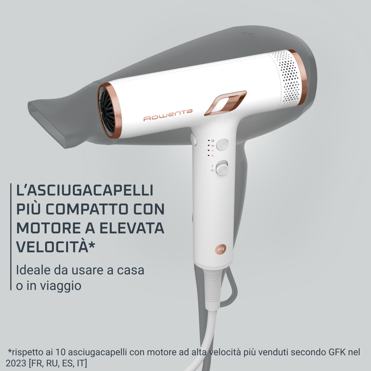 Un asciugacapelli Rowenta bianco e oro rosa con bocchetta focalizzata.
