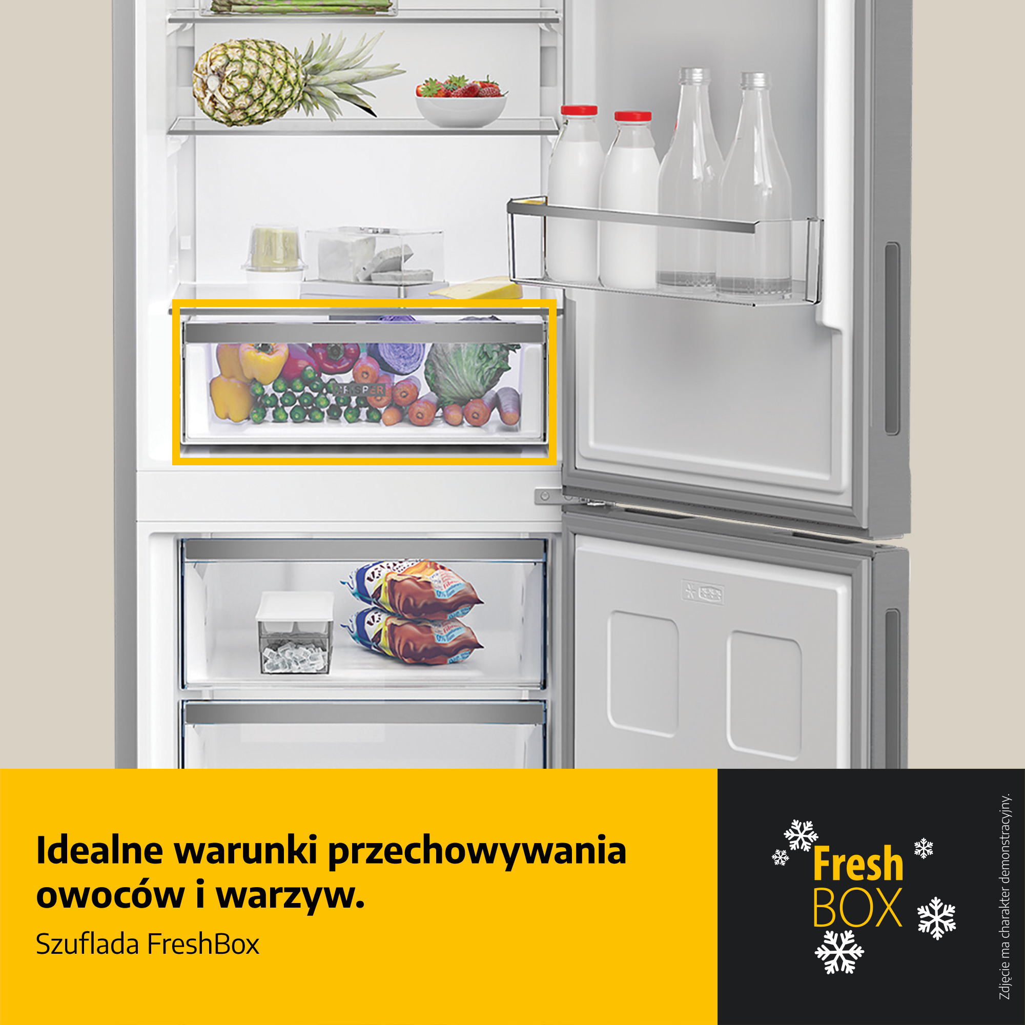 Otwarta lodówka z szufladą na warzywa pełną owoców i warzyw.