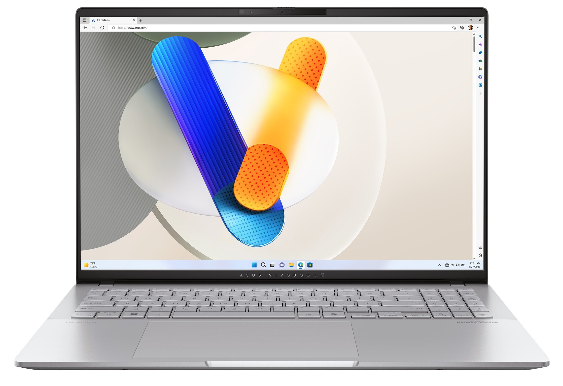 Ezüst laptop színes háttérrel a képernyőn.