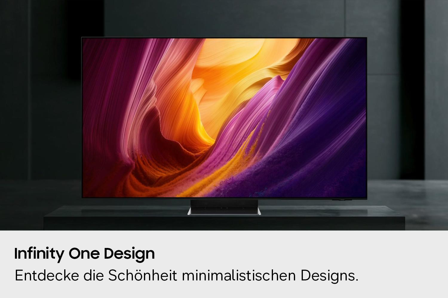 Ein moderner Fernseher mit lebendigem Bildschirminhalt steht auf einem dunklen Sockel.