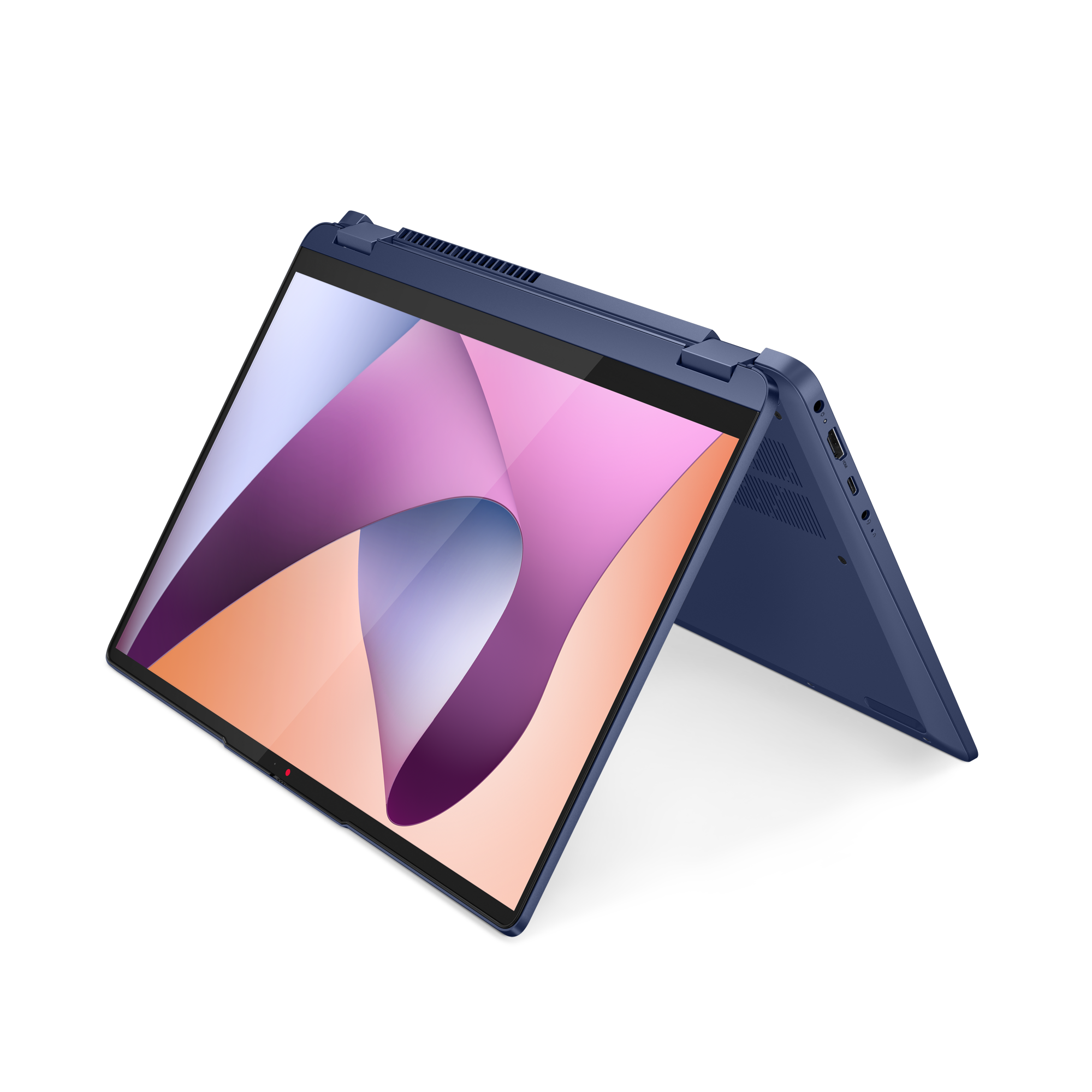 Sötétkék laptop nyitott képernyővel, színes absztrakt mintákat jelenít meg.