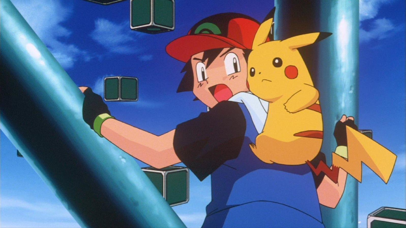 Ash und Pikachu klettern an einer blauen Stange, der Himmel ist blau mit Würfeln.