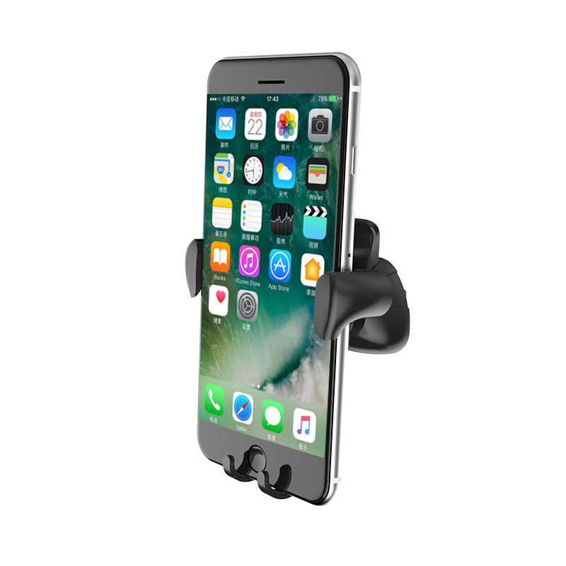 Czarny uchwyt na telefon trzyma smartfon z wieloma ikonami aplikacji na ekranie.