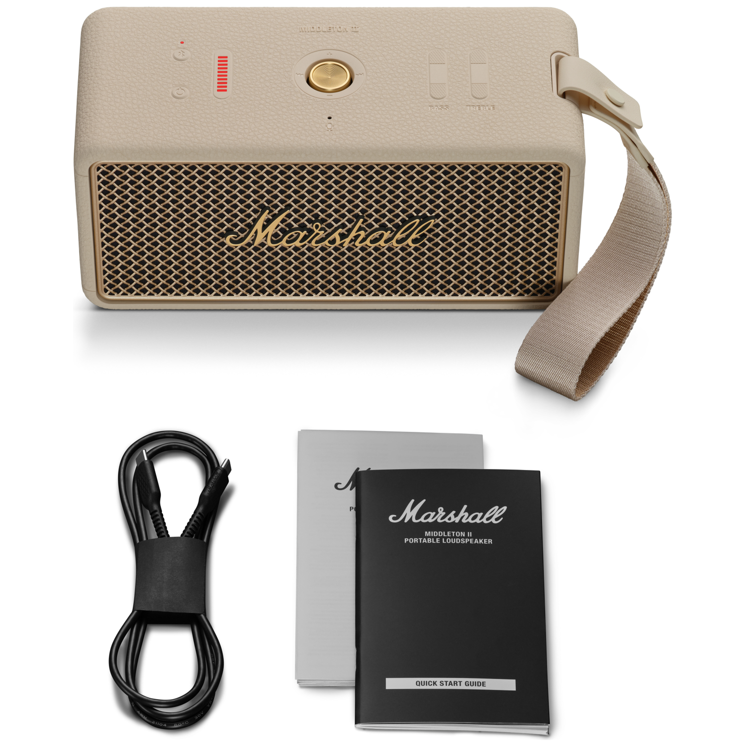 A beige Marshall Middleton speaker with charging cable and manuals.