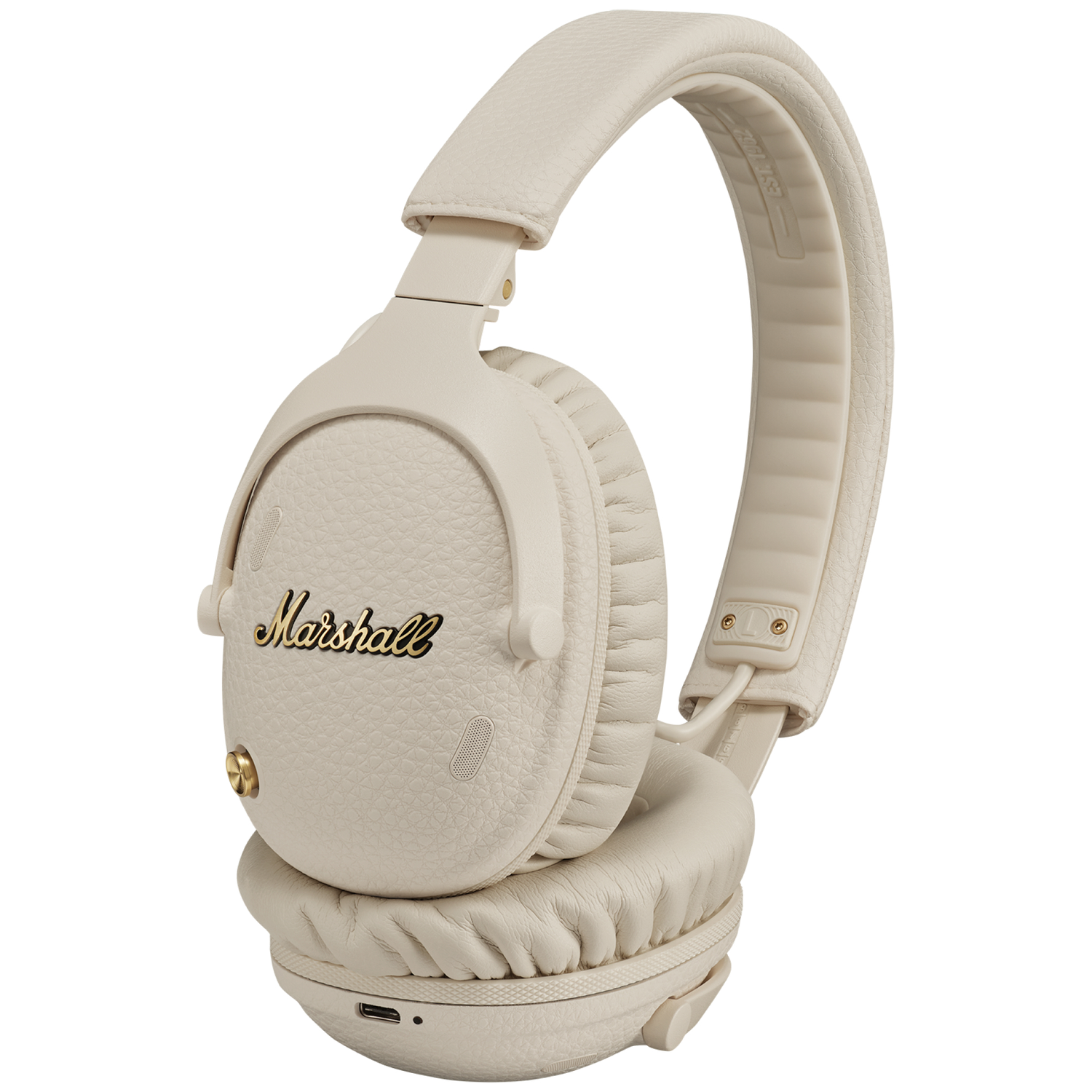 Een crème Marshall koptelefoon met goudkleurig logo en lederen textuur.