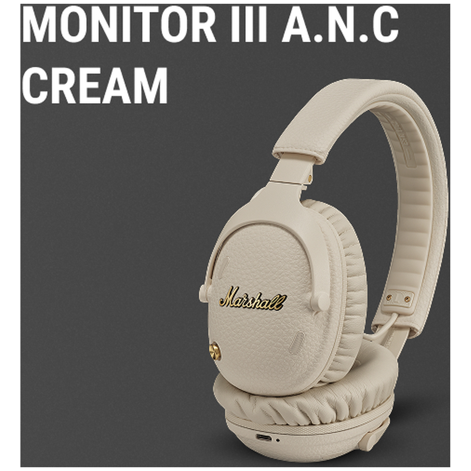 Crème Marshall Monitor III A.N.C. koptelefoon op een donkere achtergrond.