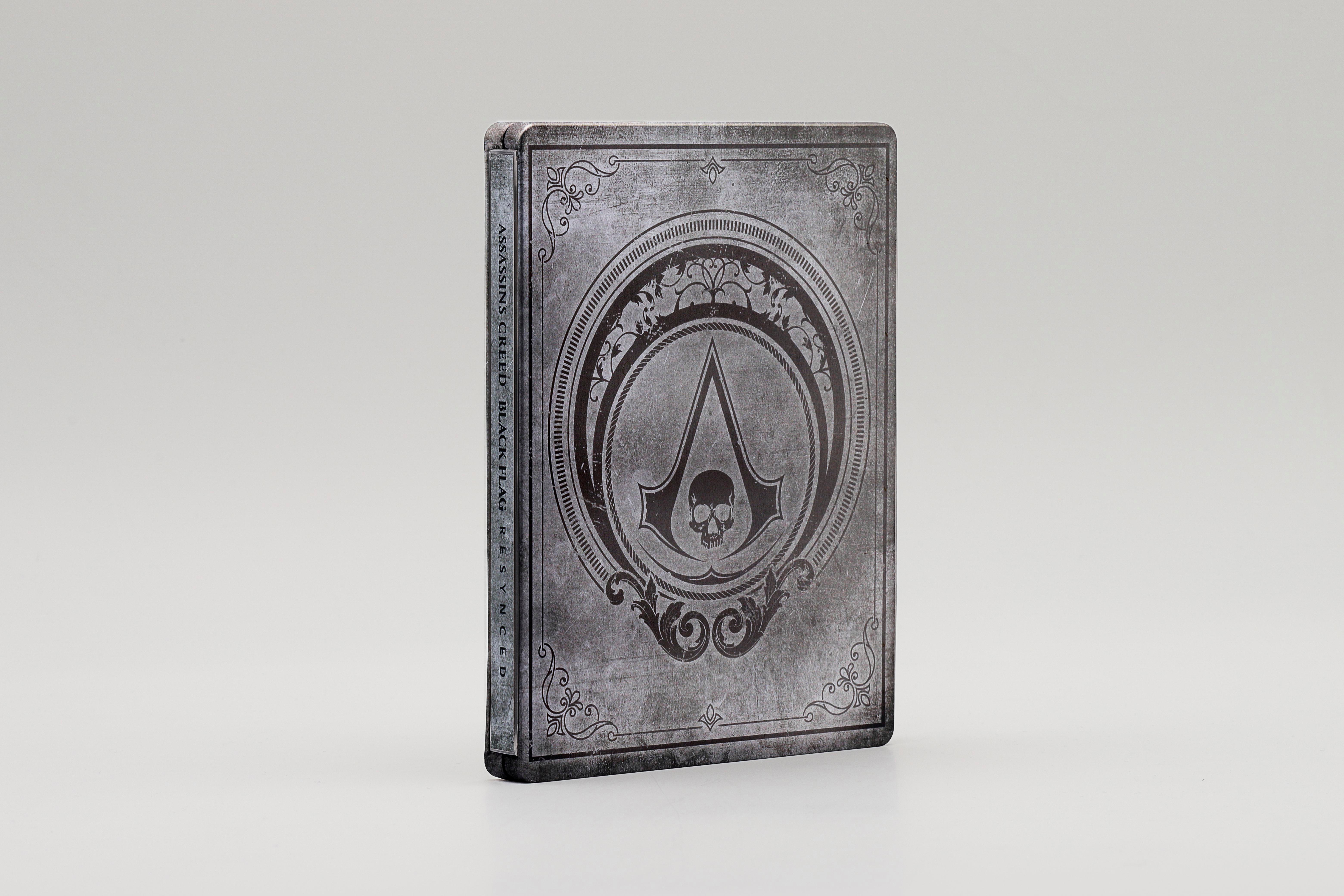 Eine silberne Steelbook-Hülle mit dem Assassin's Creed-Logo und Totenkopf.