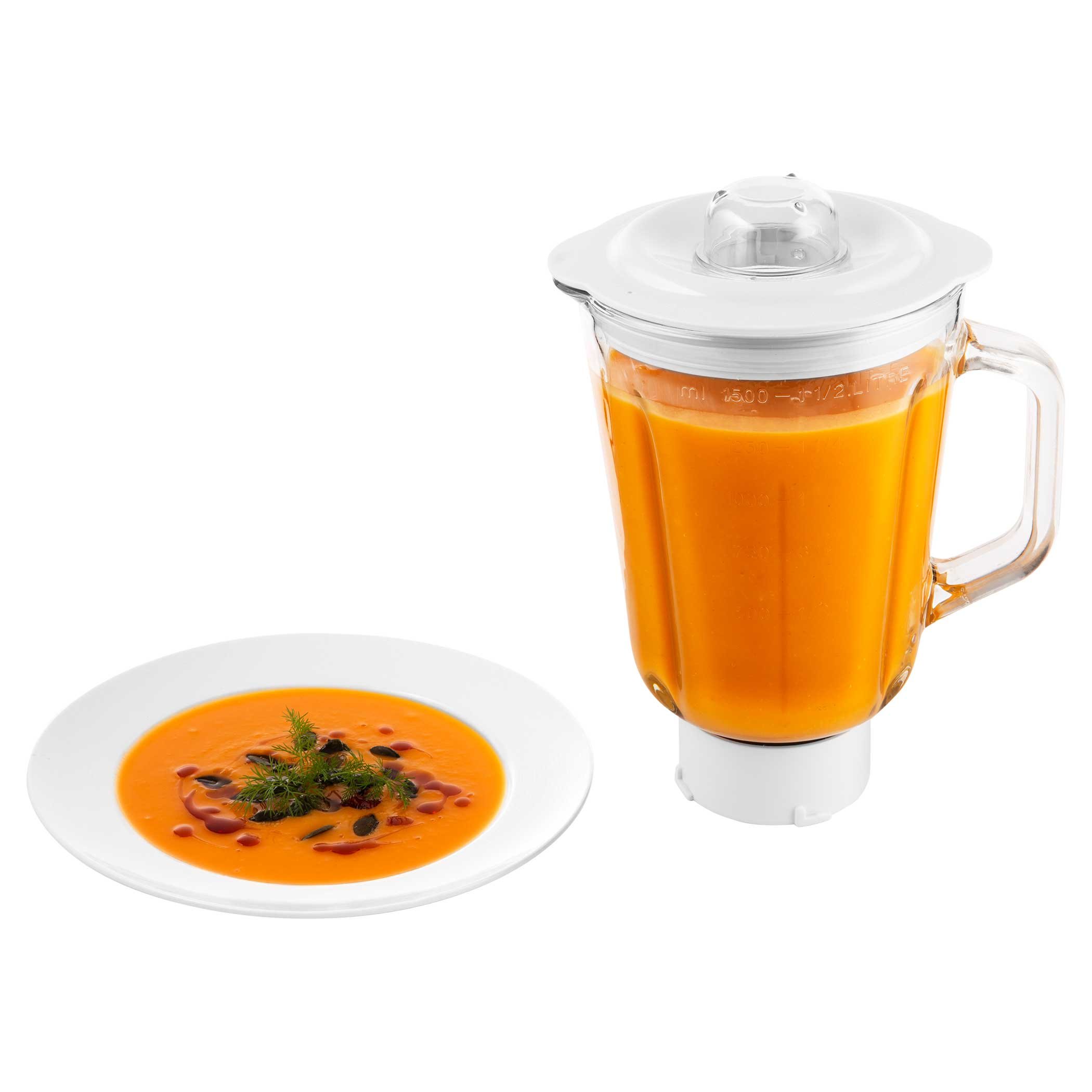 Egy tál narancsszínű leves, mellette egy levesekkel teli turmixgép.