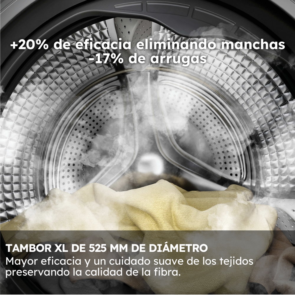 Interior de tambor de lavadora con ropa y vapor, tamaño XL.