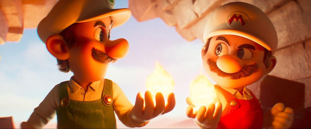 Mario und Luigi halten leuchtende Feuerbälle, sie tragen Overalls und Mützen.