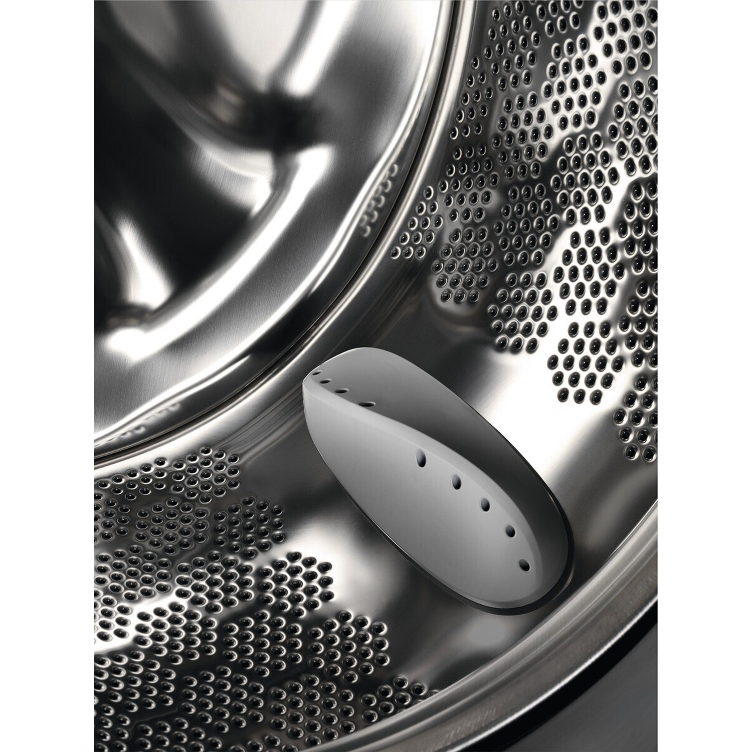 Oblò lavatrice in acciaio inox con inserto grigio.