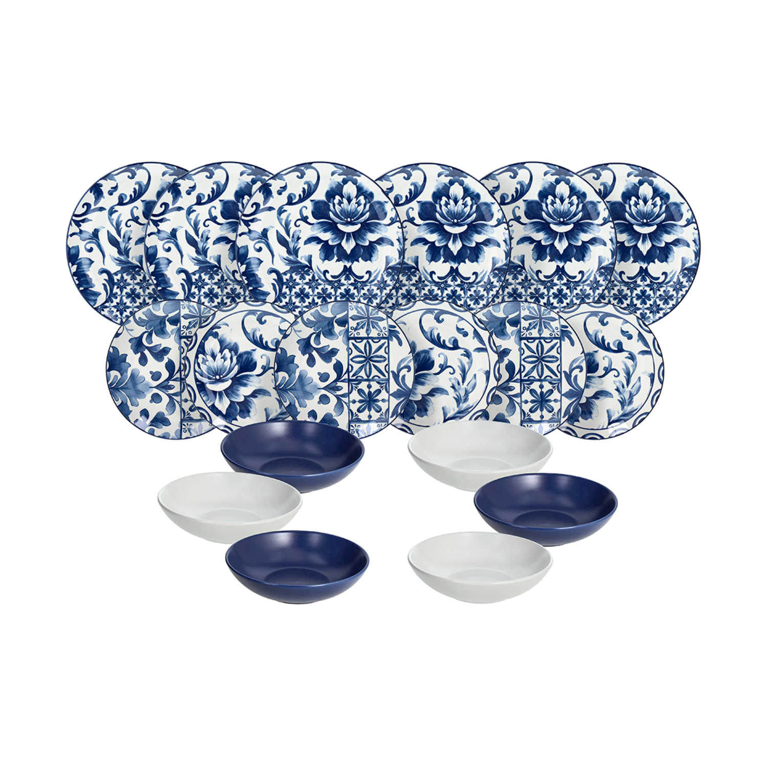 Un set di piatti e ciotole con motivo floreale blu e bianco, con ciotole blu e bianche tinta unita.