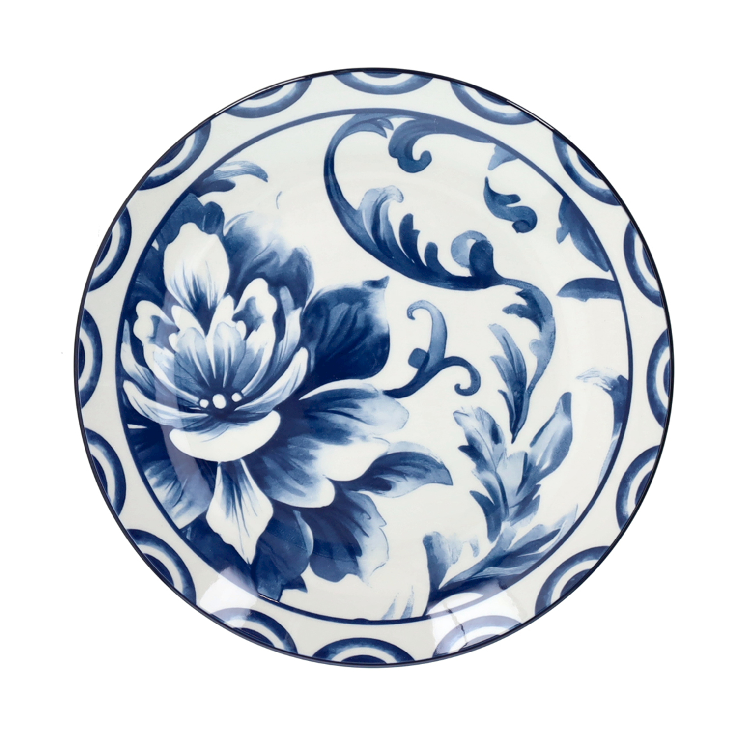 Un piatto rotondo in ceramica bianca con disegno floreale blu e bordo decorativo.