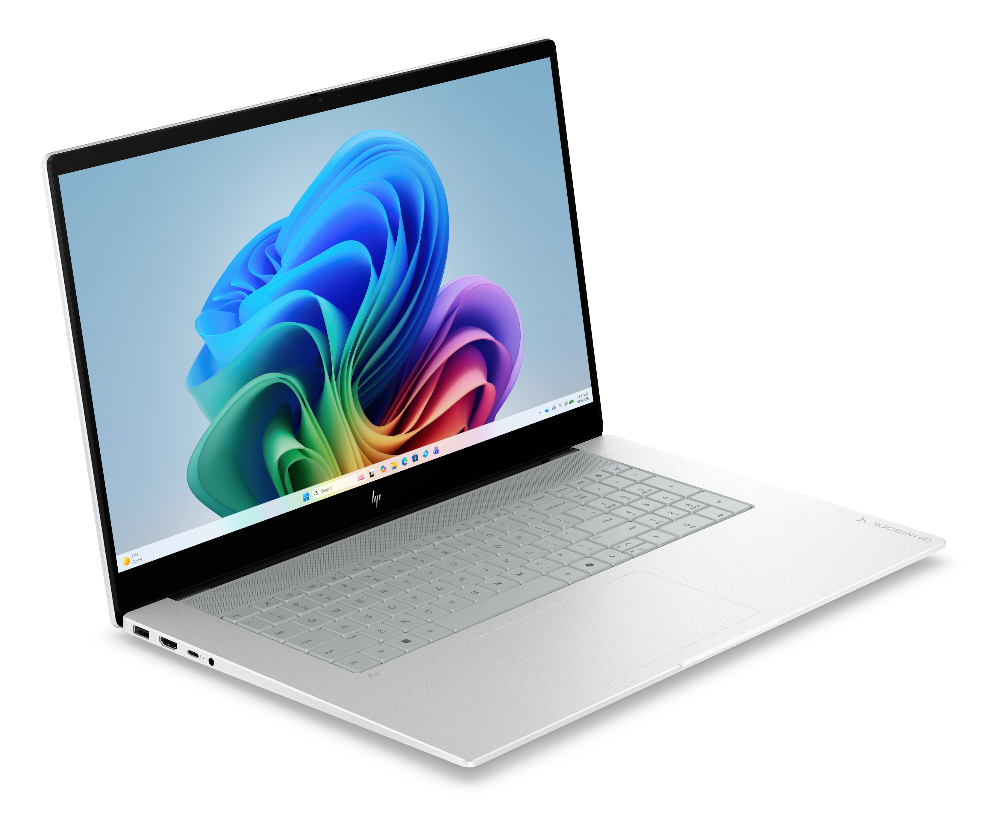Biały laptop z kolorowym, abstrakcyjnym tłem wyświetlanym na ekranie.