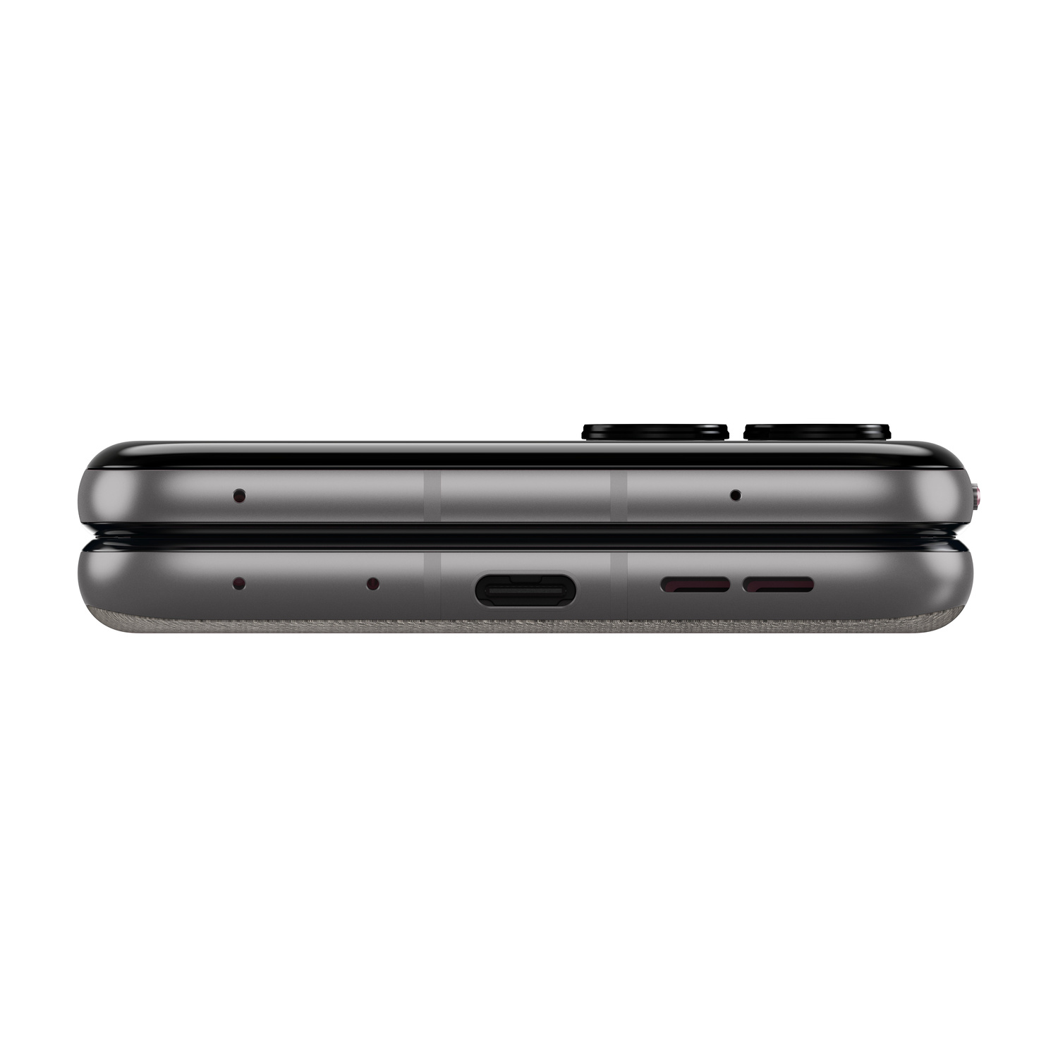 Uno smartphone grigio con porta USB-C e griglie altoparlanti.