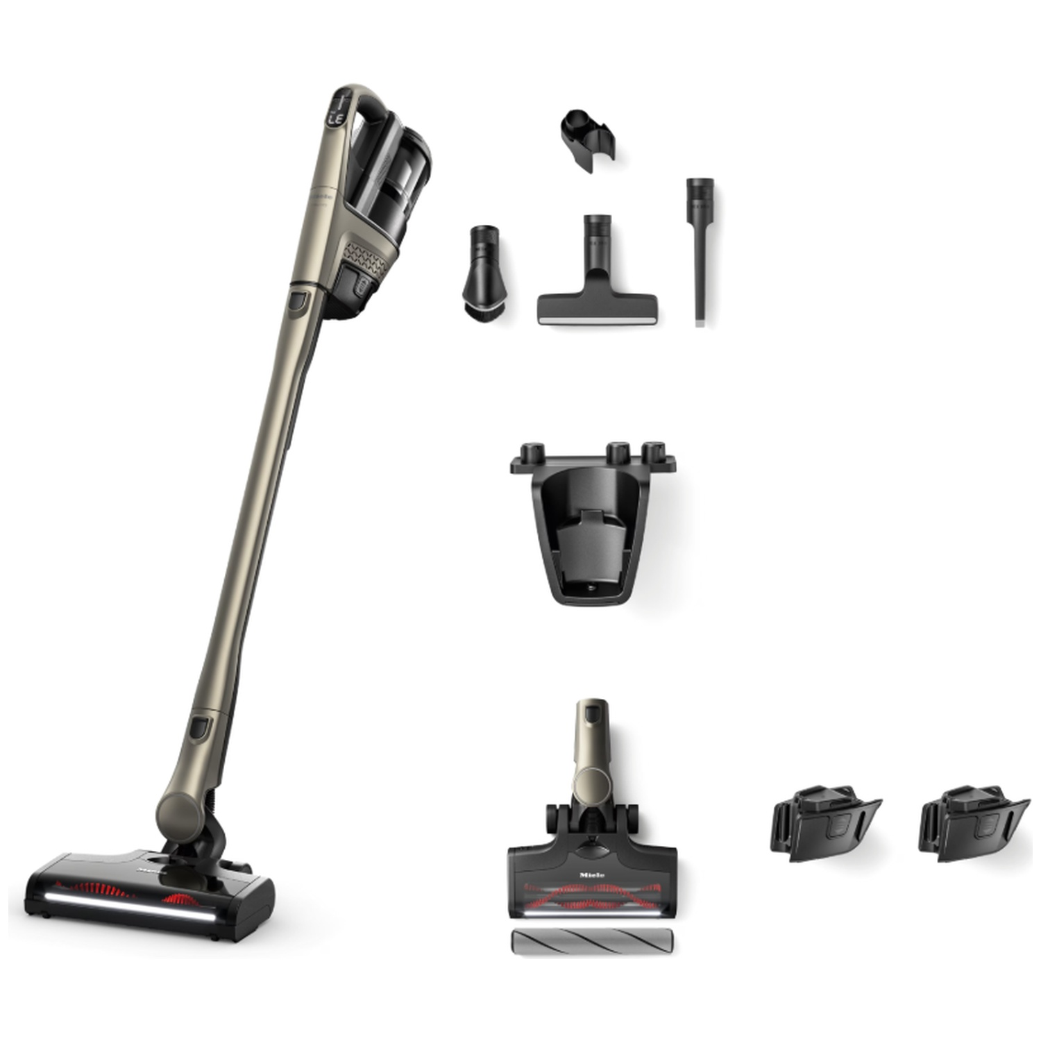 Un aspirateur sans fil doré avec accessoires dont brosses et station de charge.