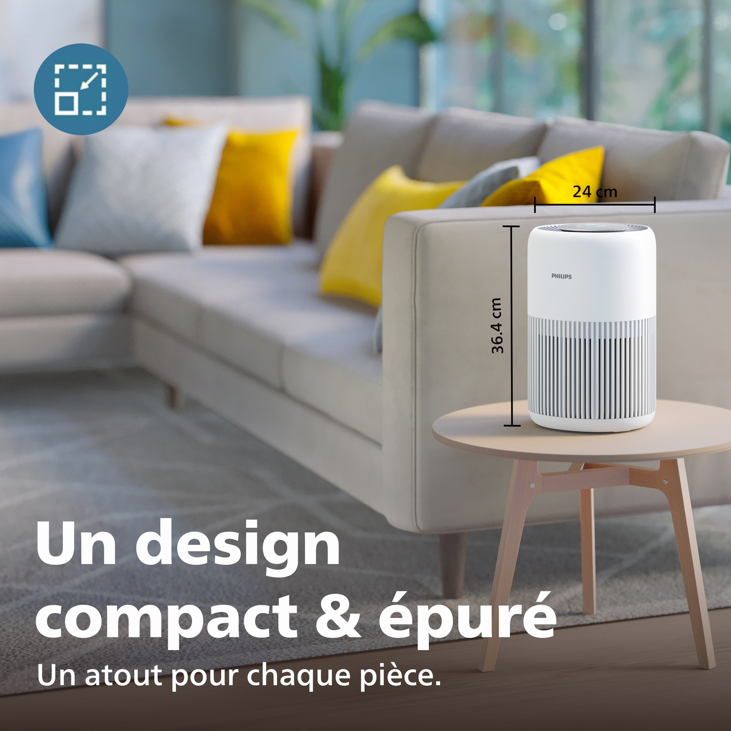 Un purificateur d'air blanc est sur une table d'appoint à côté d'un canapé.
