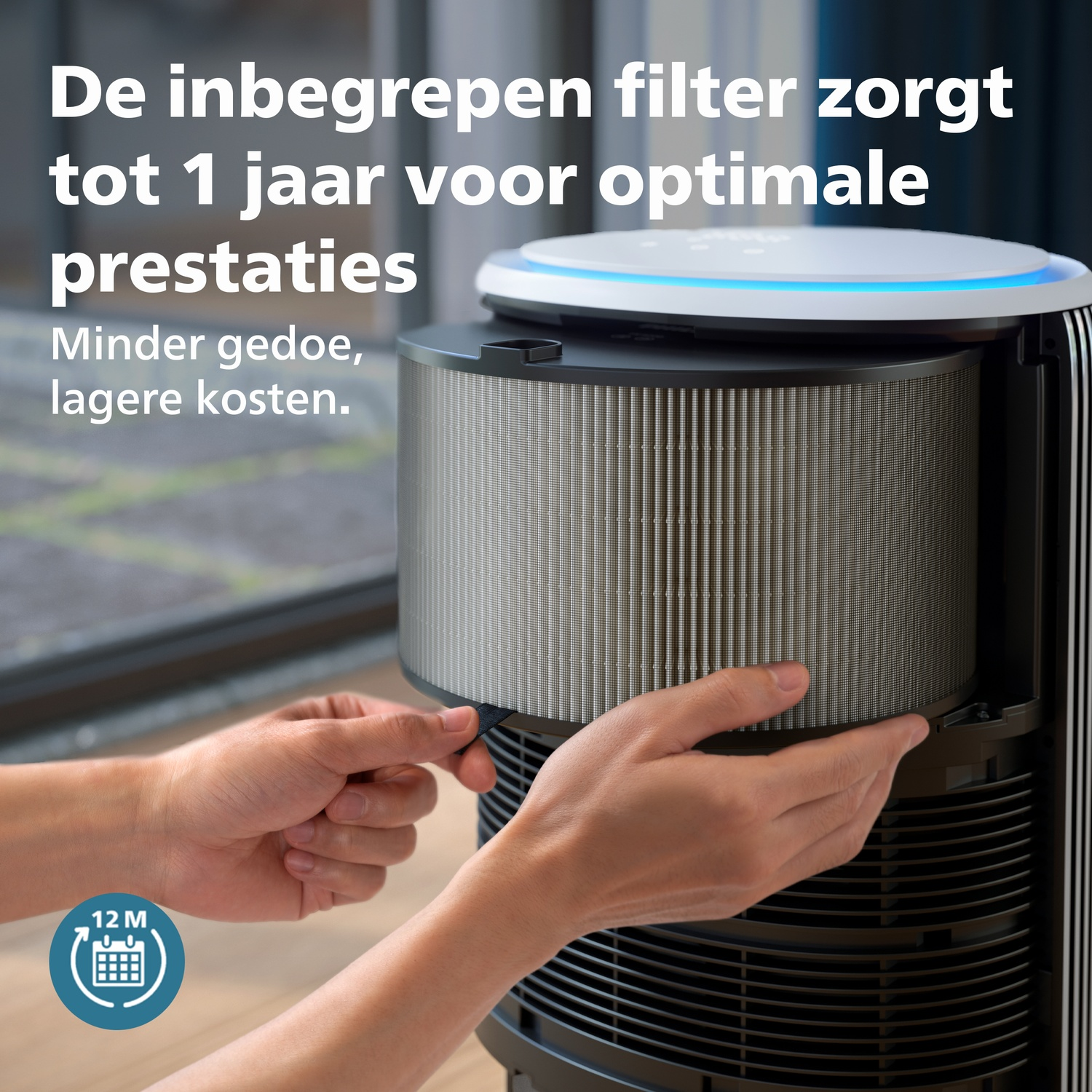 Hands replace a filter in an air purifier. Text: Included filter lasts 1 year.