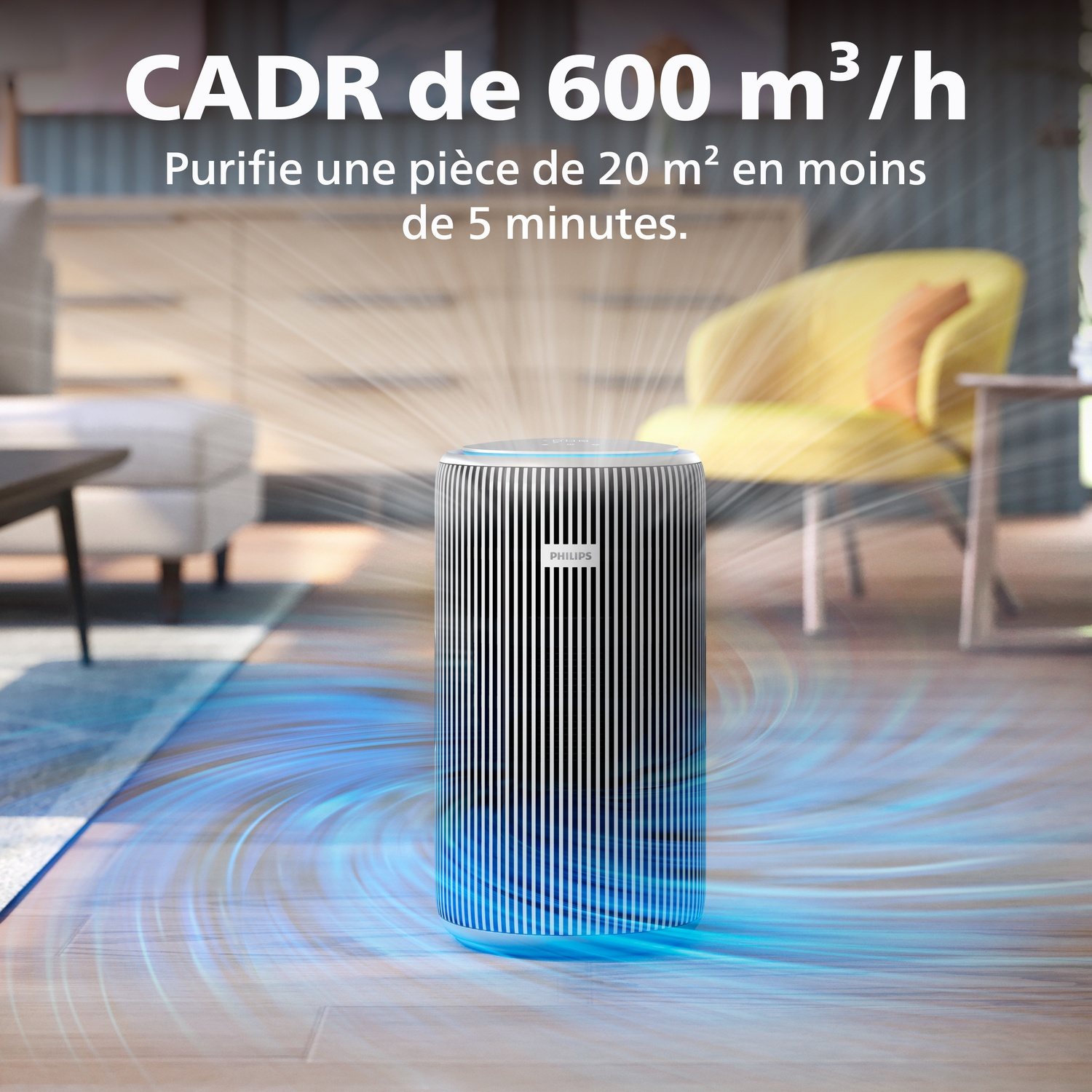 Purificateur d'air Philips avec flux d'air bleu dans un salon. CADR 600 m³/h.
