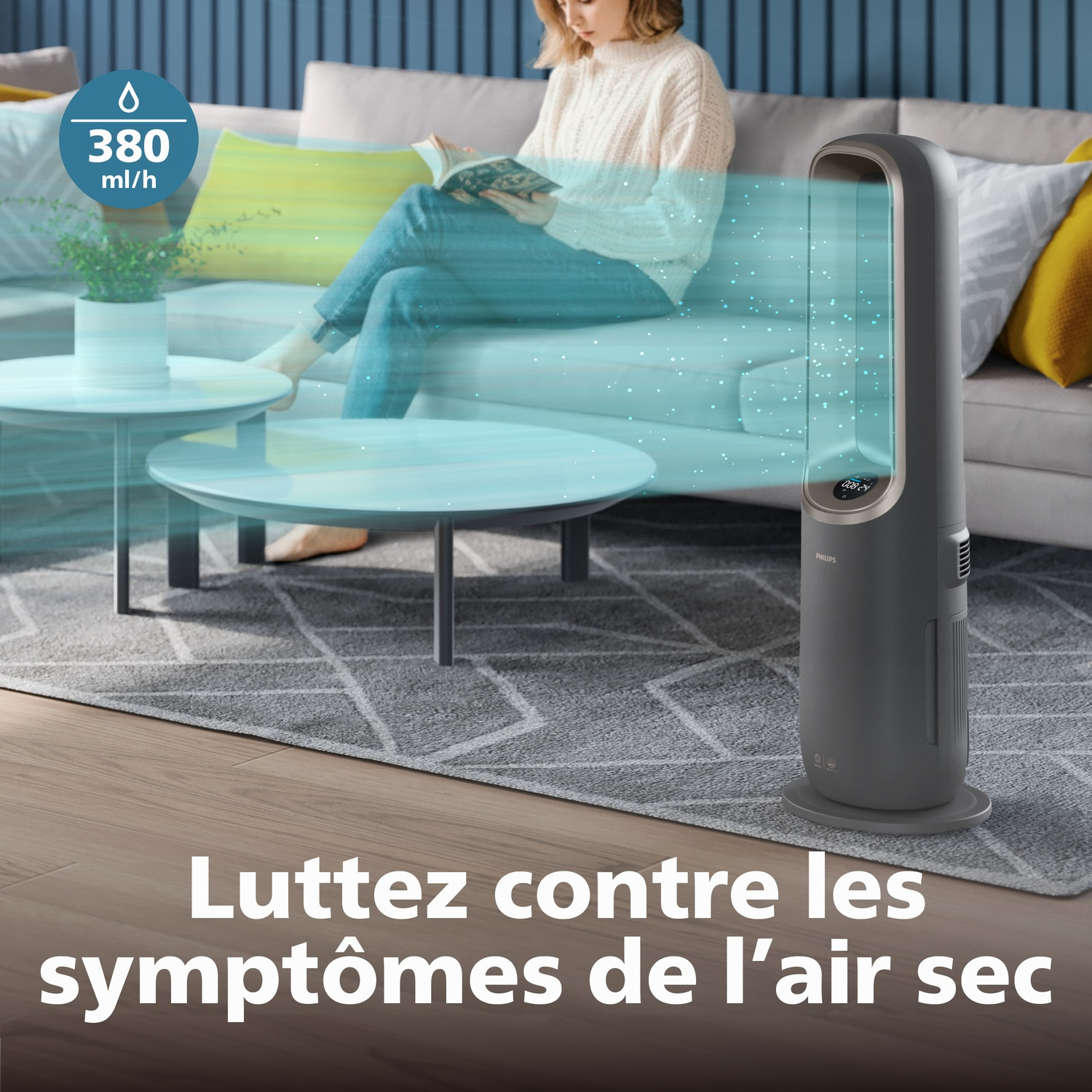 Un humidificateur de 380 ml/h dans un salon, une femme lit.