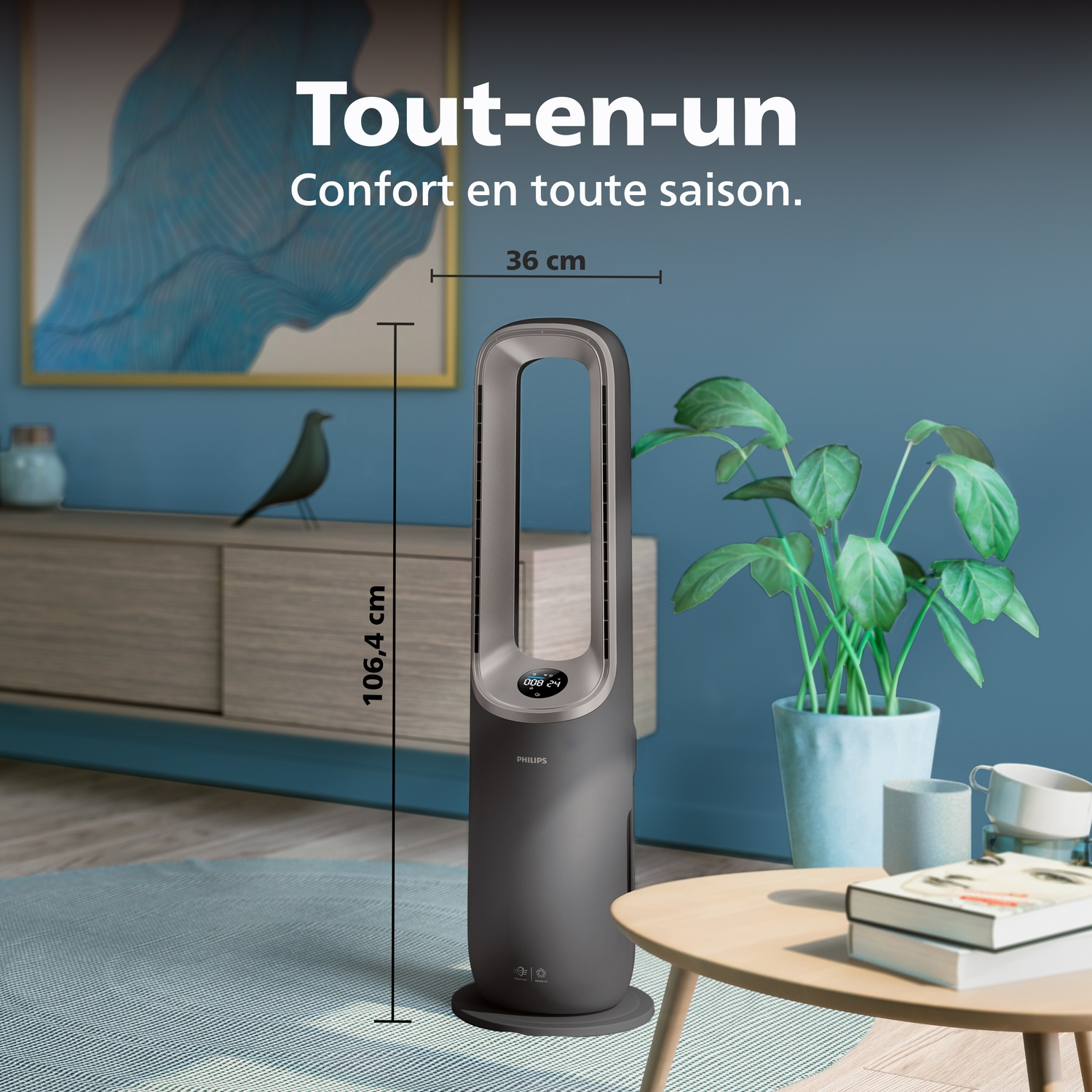Un ventilateur tour est sur un tapis, à côté d'une plante en pot.