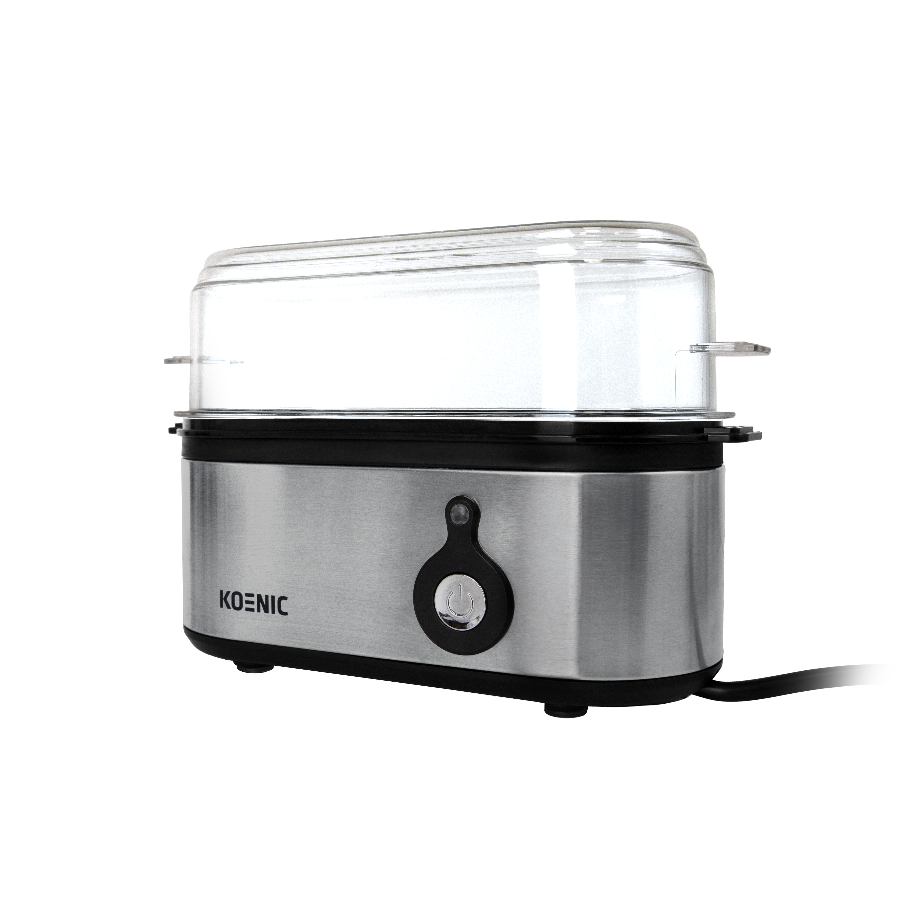 Un vaporizador plateado de dos niveles con tapa transparente se asienta sobre fondo negro.