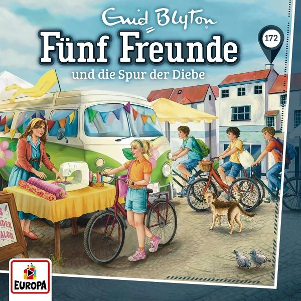 Kinder und ein Van auf einem Marktstand mit Hund und Tauben.