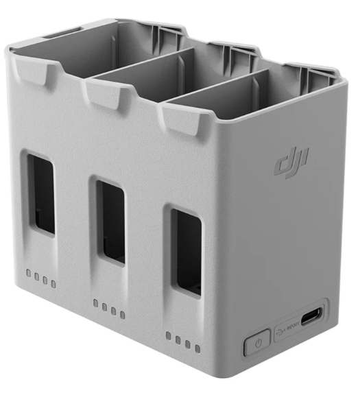Szara ładowarka hub DJI z trzema gniazdami i portem USB-C.