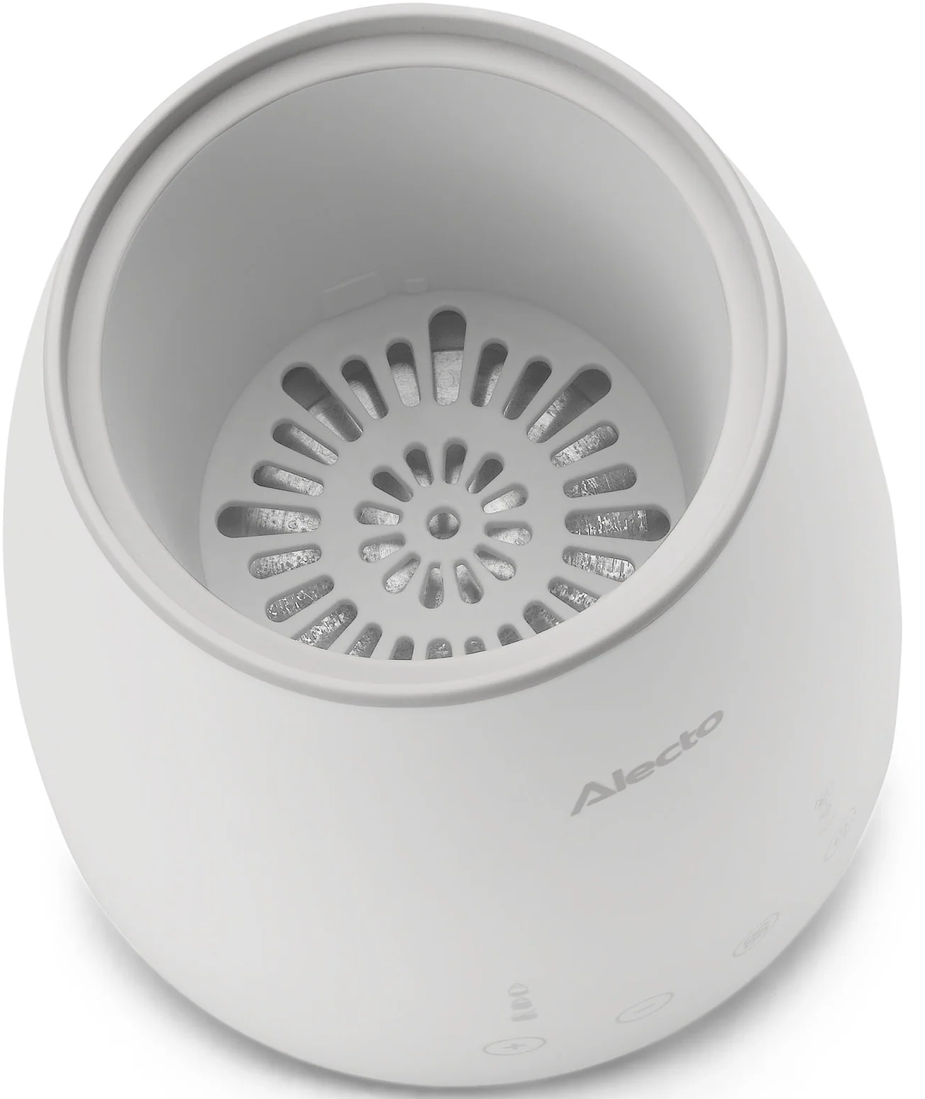 Un chauffe-biberon blanc avec un insert perforé à l'intérieur.